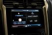 2014 Sterling Gray Metallic /Dune Ford Fusion Hybrid SE (3FA6P0LU0ER) with an 2.0L I4 Atkinson-Cycle Hybrid engine, CVT transmission, located at 15300 Midway Rd., Addison, TX, 75001, (972) 702-0011, 32.958321, -96.838074- Photo#35