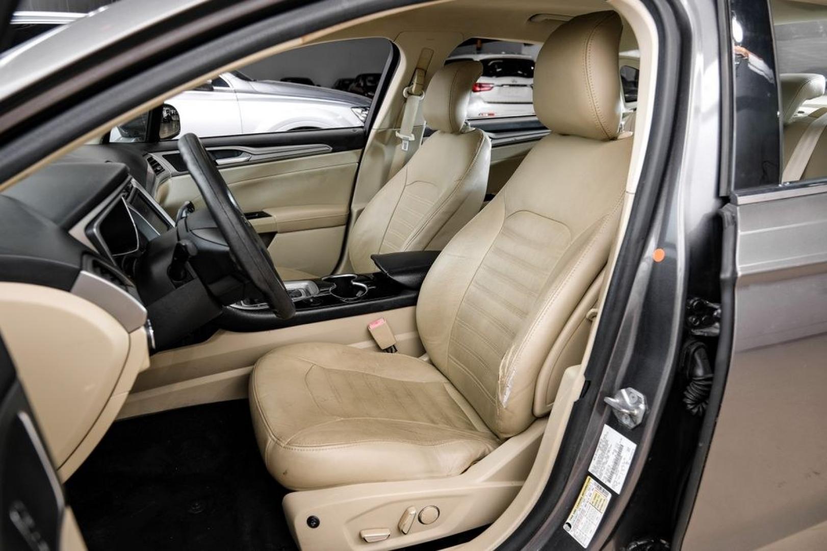 2014 Sterling Gray Metallic /Dune Ford Fusion Hybrid SE (3FA6P0LU0ER) with an 2.0L I4 Atkinson-Cycle Hybrid engine, CVT transmission, located at 15300 Midway Rd., Addison, TX, 75001, (972) 702-0011, 32.958321, -96.838074- Photo#39