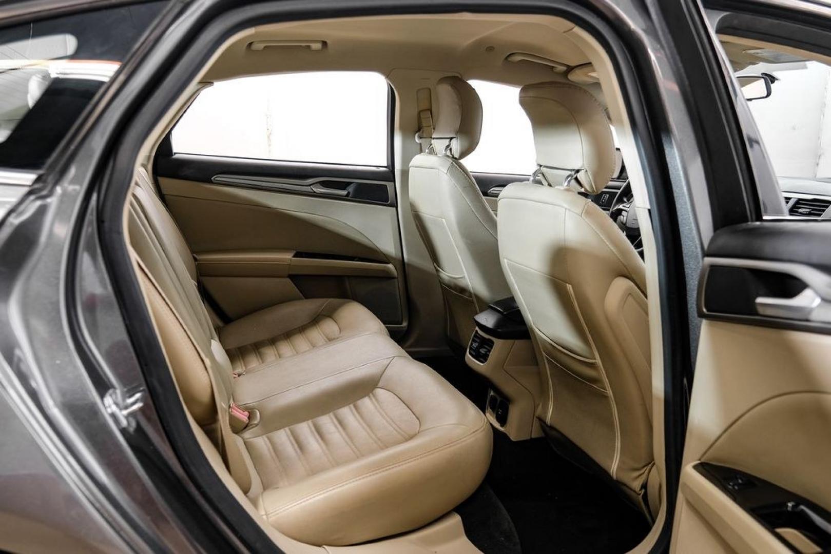 2014 Sterling Gray Metallic /Dune Ford Fusion Hybrid SE (3FA6P0LU0ER) with an 2.0L I4 Atkinson-Cycle Hybrid engine, CVT transmission, located at 15300 Midway Rd., Addison, TX, 75001, (972) 702-0011, 32.958321, -96.838074- Photo#43