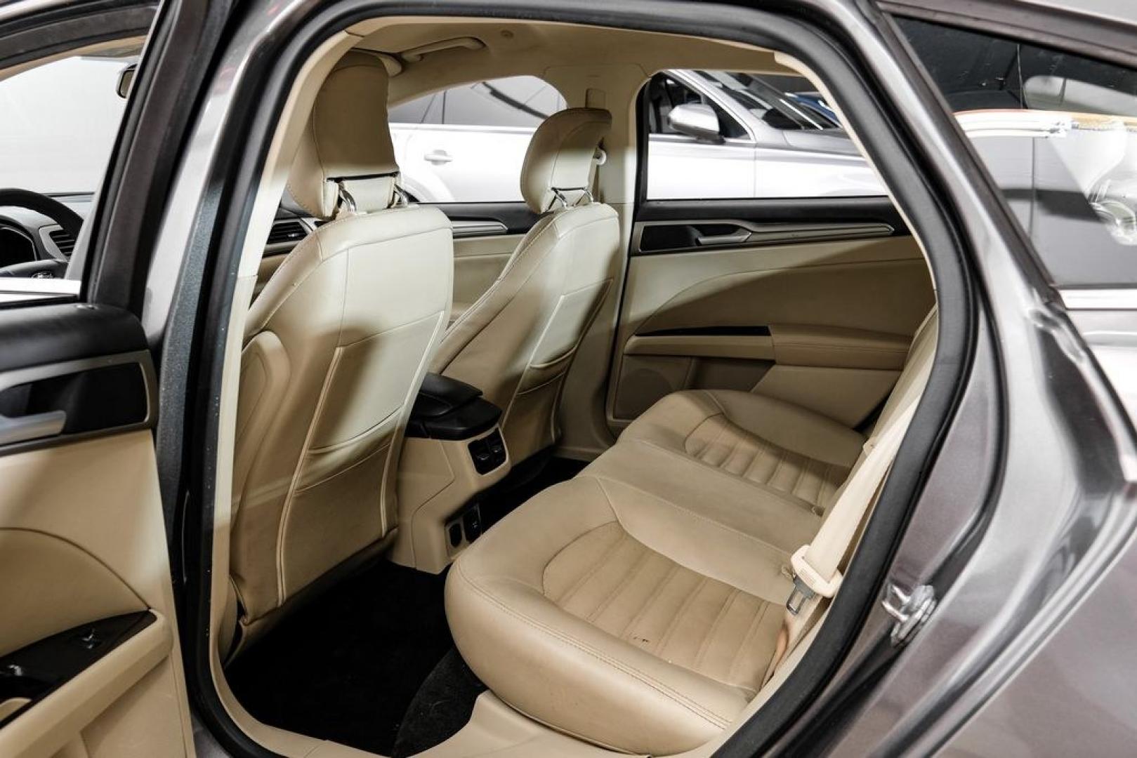 2014 Sterling Gray Metallic /Dune Ford Fusion Hybrid SE (3FA6P0LU0ER) with an 2.0L I4 Atkinson-Cycle Hybrid engine, CVT transmission, located at 15300 Midway Rd., Addison, TX, 75001, (972) 702-0011, 32.958321, -96.838074- Photo#45