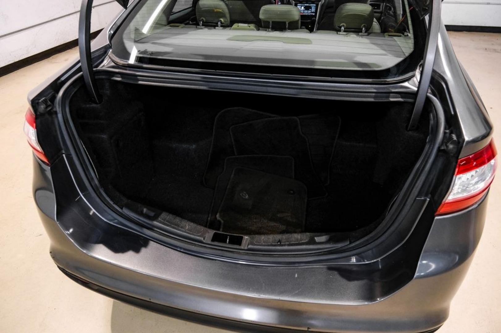 2014 Sterling Gray Metallic /Dune Ford Fusion Hybrid SE (3FA6P0LU0ER) with an 2.0L I4 Atkinson-Cycle Hybrid engine, CVT transmission, located at 15300 Midway Rd., Addison, TX, 75001, (972) 702-0011, 32.958321, -96.838074- Photo#61