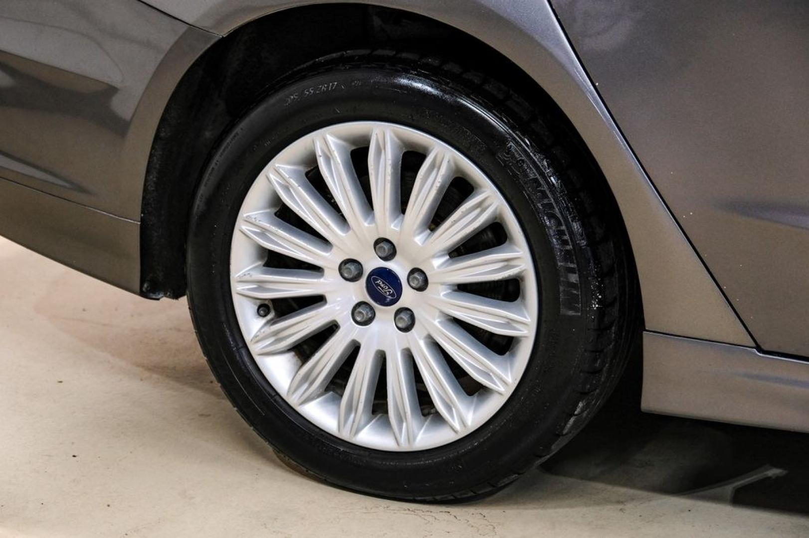 2014 Sterling Gray Metallic /Dune Ford Fusion Hybrid SE (3FA6P0LU0ER) with an 2.0L I4 Atkinson-Cycle Hybrid engine, CVT transmission, located at 15300 Midway Rd., Addison, TX, 75001, (972) 702-0011, 32.958321, -96.838074- Photo#63