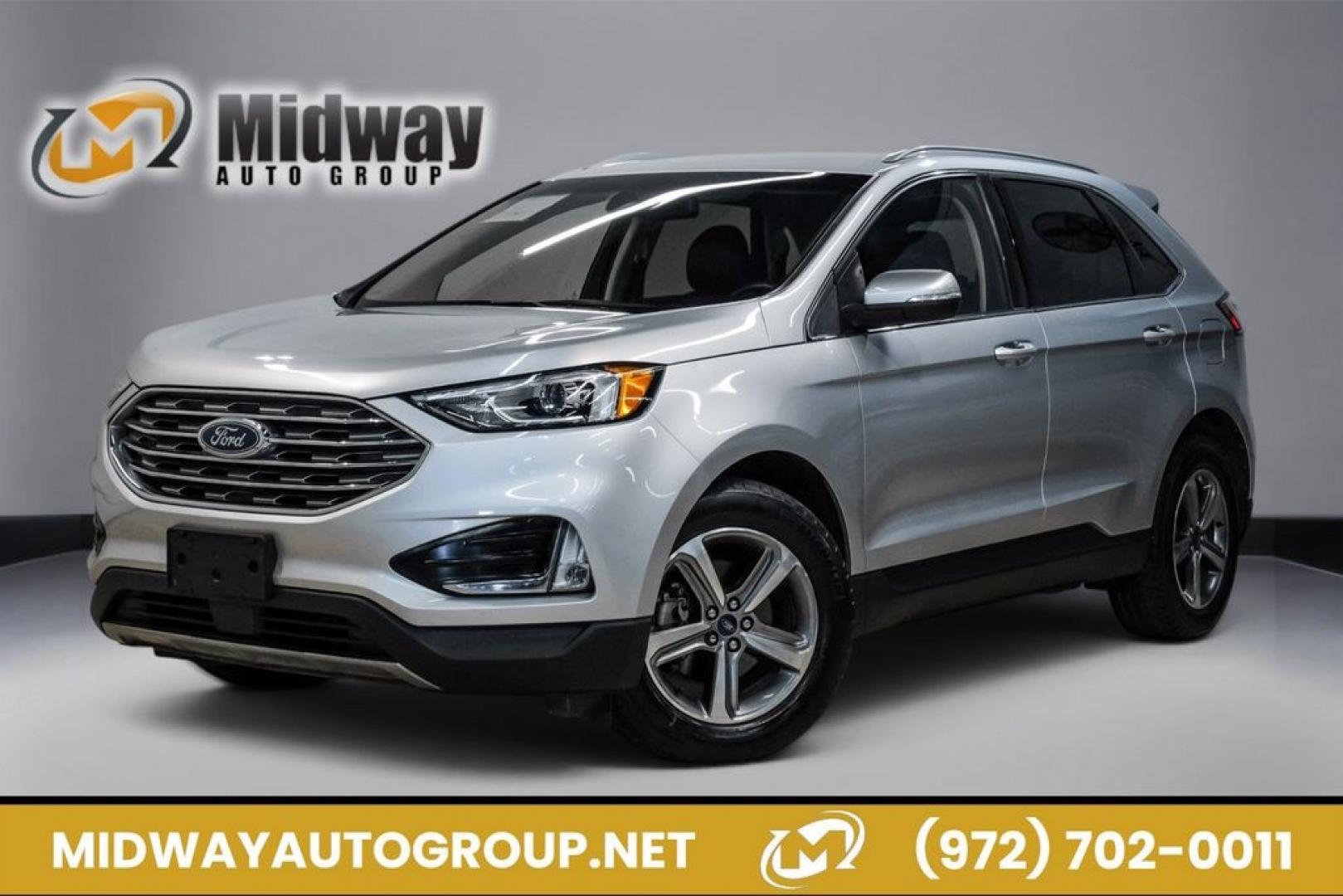 2019 Ingot Silver /Ebony Ford Edge SEL (2FMPK3J9XKB) with an EcoBoost 2.0L I4 GTDi DOHC Turbocharged VCT engine, Automatic transmission, located at 15300 Midway Rd., Addison, TX, 75001, (972) 702-0011, 32.958321, -96.838074- Photo#0