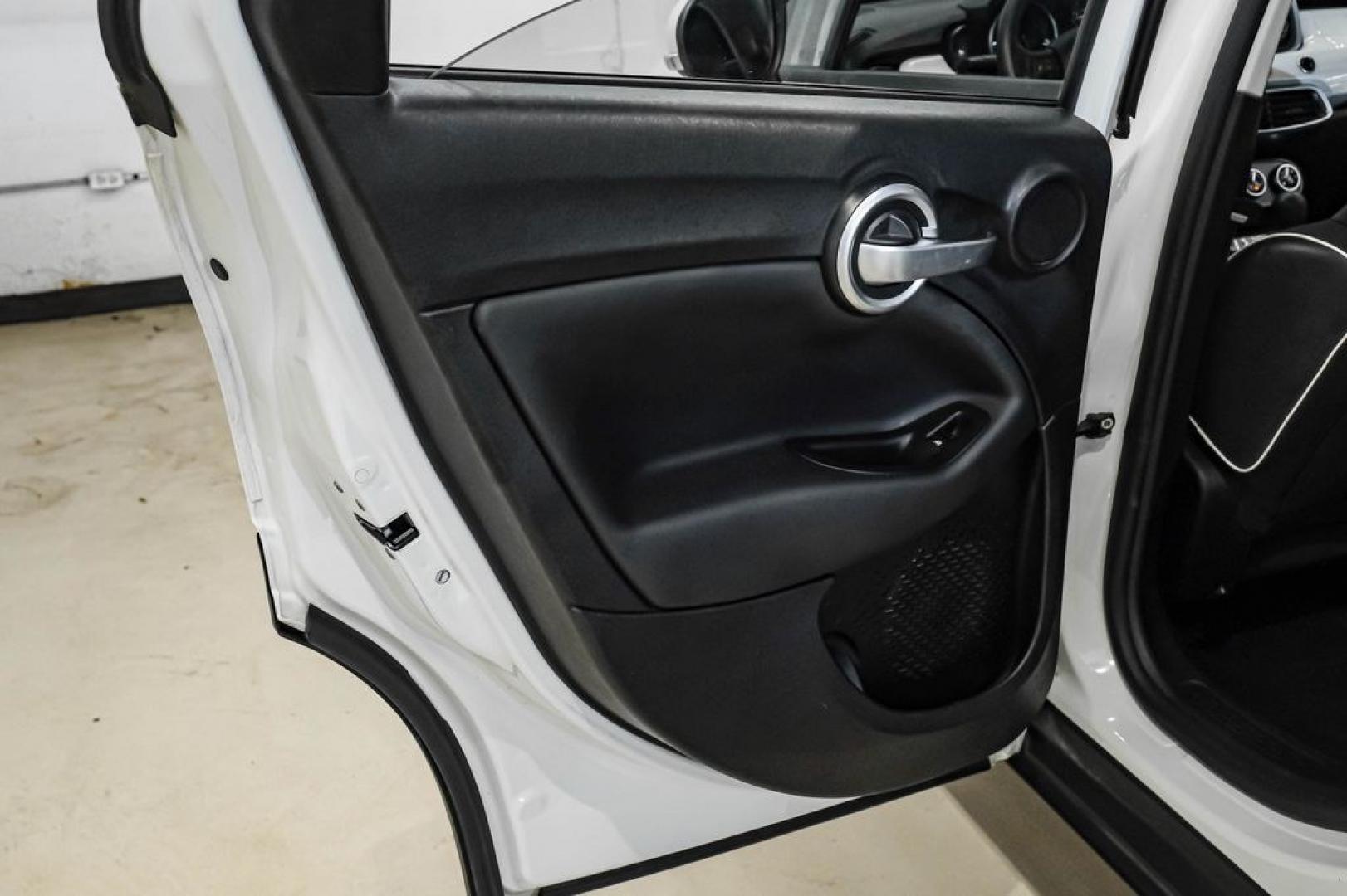 2017 White Clearcoat /Black Fiat 500X Pop (ZFBCFXAB5HP) with an 2.4L I4 MultiAir engine, Automatic transmission, located at 15300 Midway Rd., Addison, TX, 75001, (972) 702-0011, 32.958321, -96.838074- Photo#42