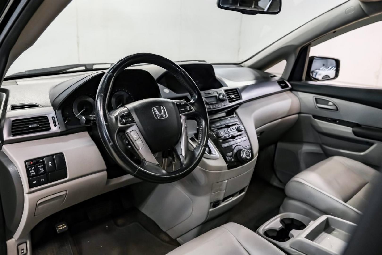 2013 Crystal Black Pearl /Truffle Honda Odyssey Touring Elite (5FNRL5H96DB) with an 3.5L V6 SOHC i-VTEC 24V engine, Automatic transmission, located at 15300 Midway Rd., Addison, TX, 75001, (972) 702-0011, 32.958321, -96.838074- Photo#2