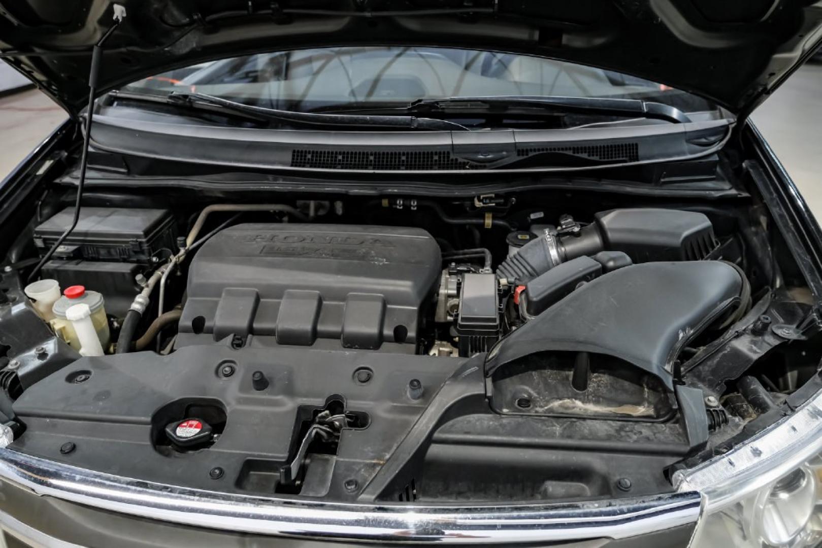 2013 Crystal Black Pearl /Truffle Honda Odyssey Touring Elite (5FNRL5H96DB) with an 3.5L V6 SOHC i-VTEC 24V engine, Automatic transmission, located at 15300 Midway Rd., Addison, TX, 75001, (972) 702-0011, 32.958321, -96.838074- Photo#44