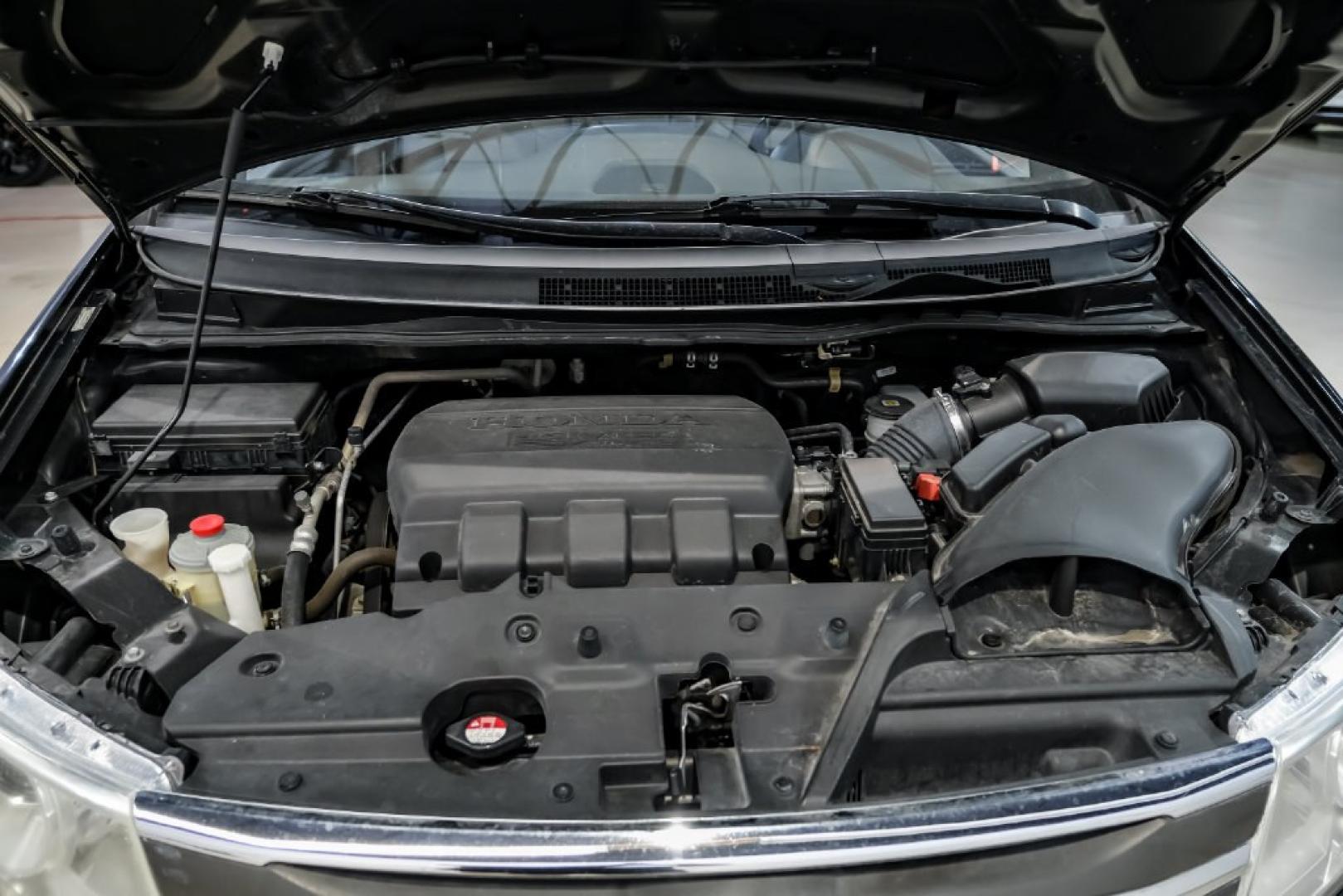 2013 Crystal Black Pearl /Truffle Honda Odyssey Touring Elite (5FNRL5H96DB) with an 3.5L V6 SOHC i-VTEC 24V engine, Automatic transmission, located at 15300 Midway Rd., Addison, TX, 75001, (972) 702-0011, 32.958321, -96.838074- Photo#45