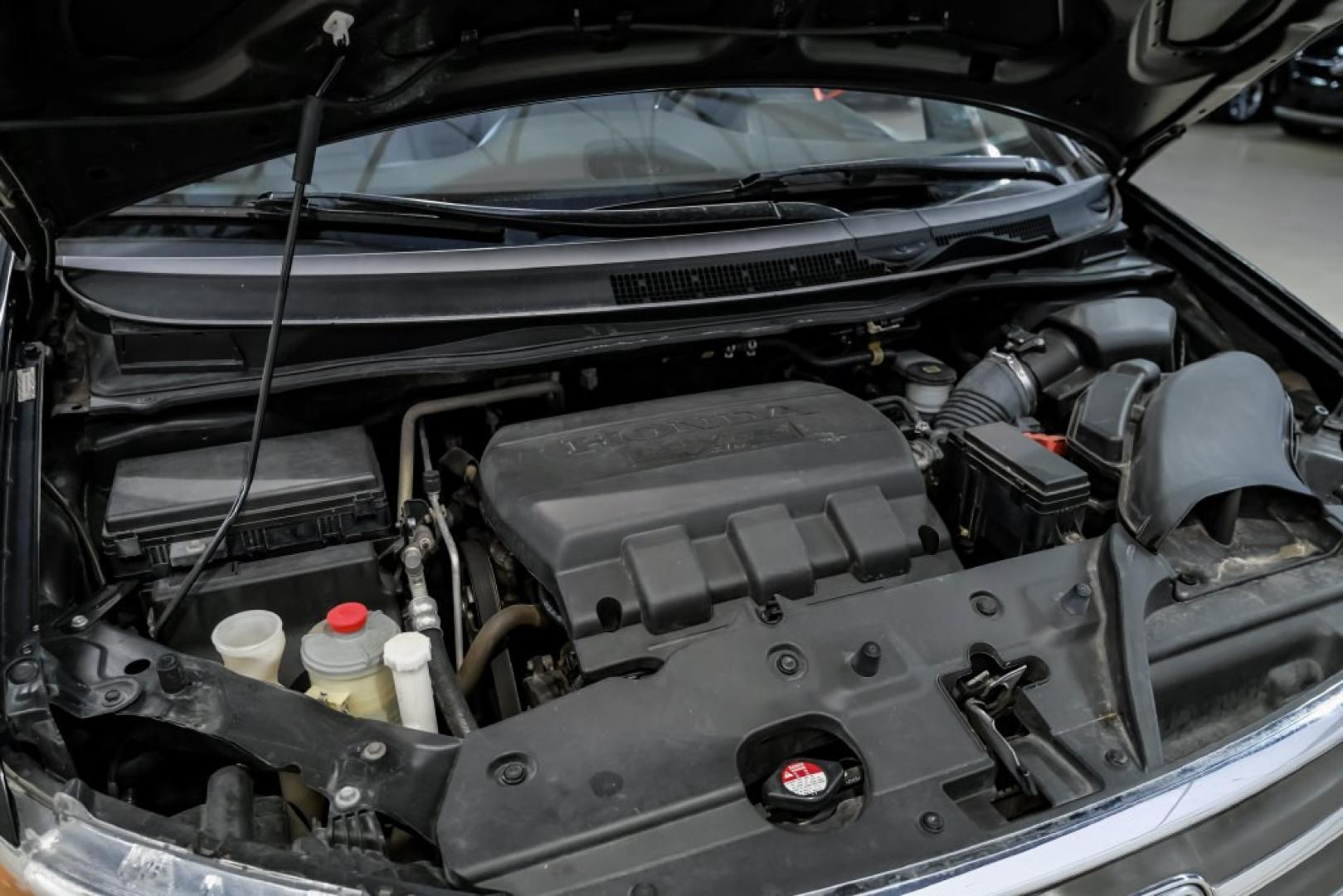 2013 Crystal Black Pearl /Truffle Honda Odyssey Touring Elite (5FNRL5H96DB) with an 3.5L V6 SOHC i-VTEC 24V engine, Automatic transmission, located at 15300 Midway Rd., Addison, TX, 75001, (972) 702-0011, 32.958321, -96.838074- Photo#46