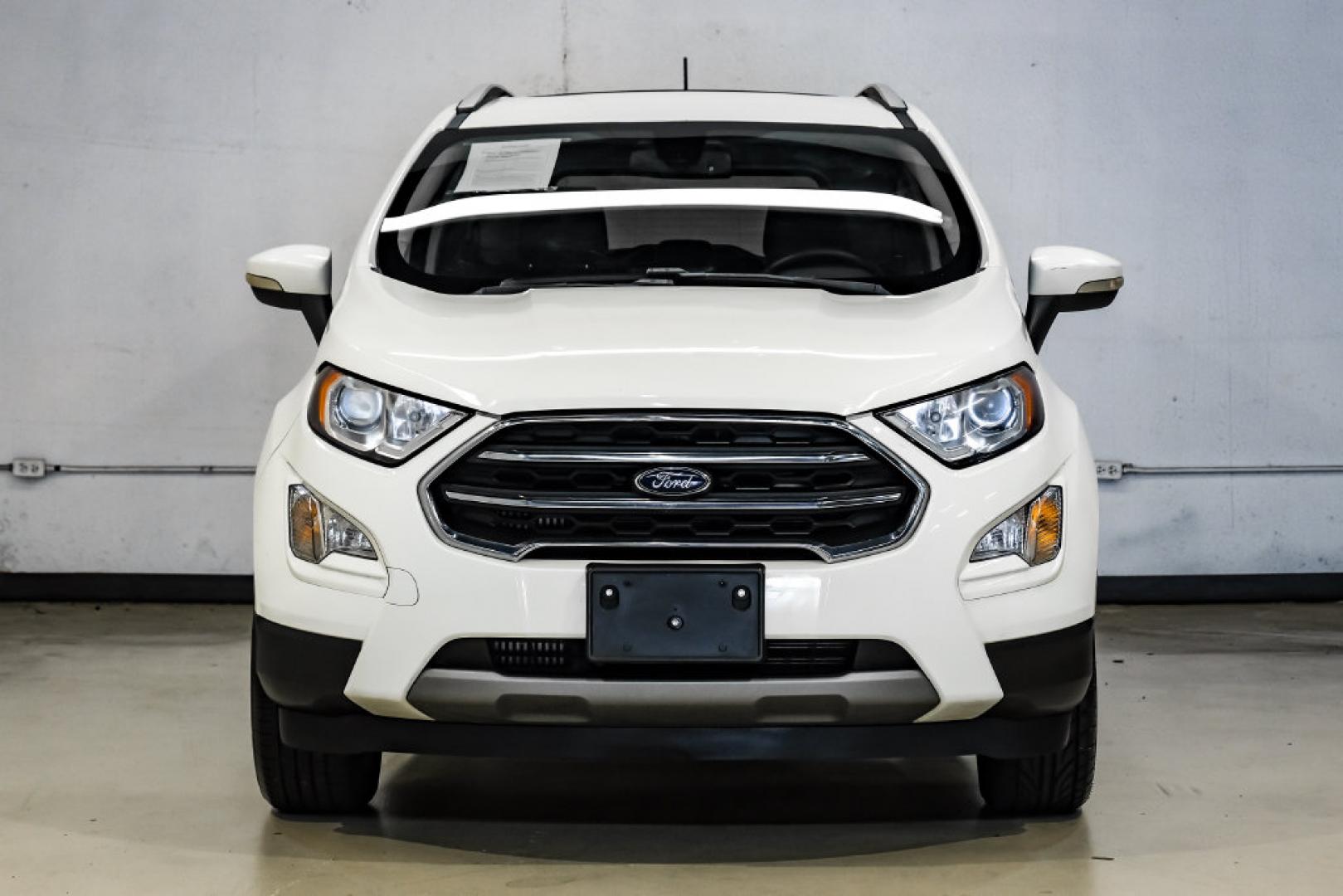 2021 Diamond White /Ebony Black Ford EcoSport Titanium (MAJ3S2KE2MC) with an EcoBoost 1.0L I3 GTDi DOHC Turbocharged VCT engine, Automatic transmission, located at 15300 Midway Rd., Addison, TX, 75001, (972) 702-0011, 32.958321, -96.838074- Photo#7