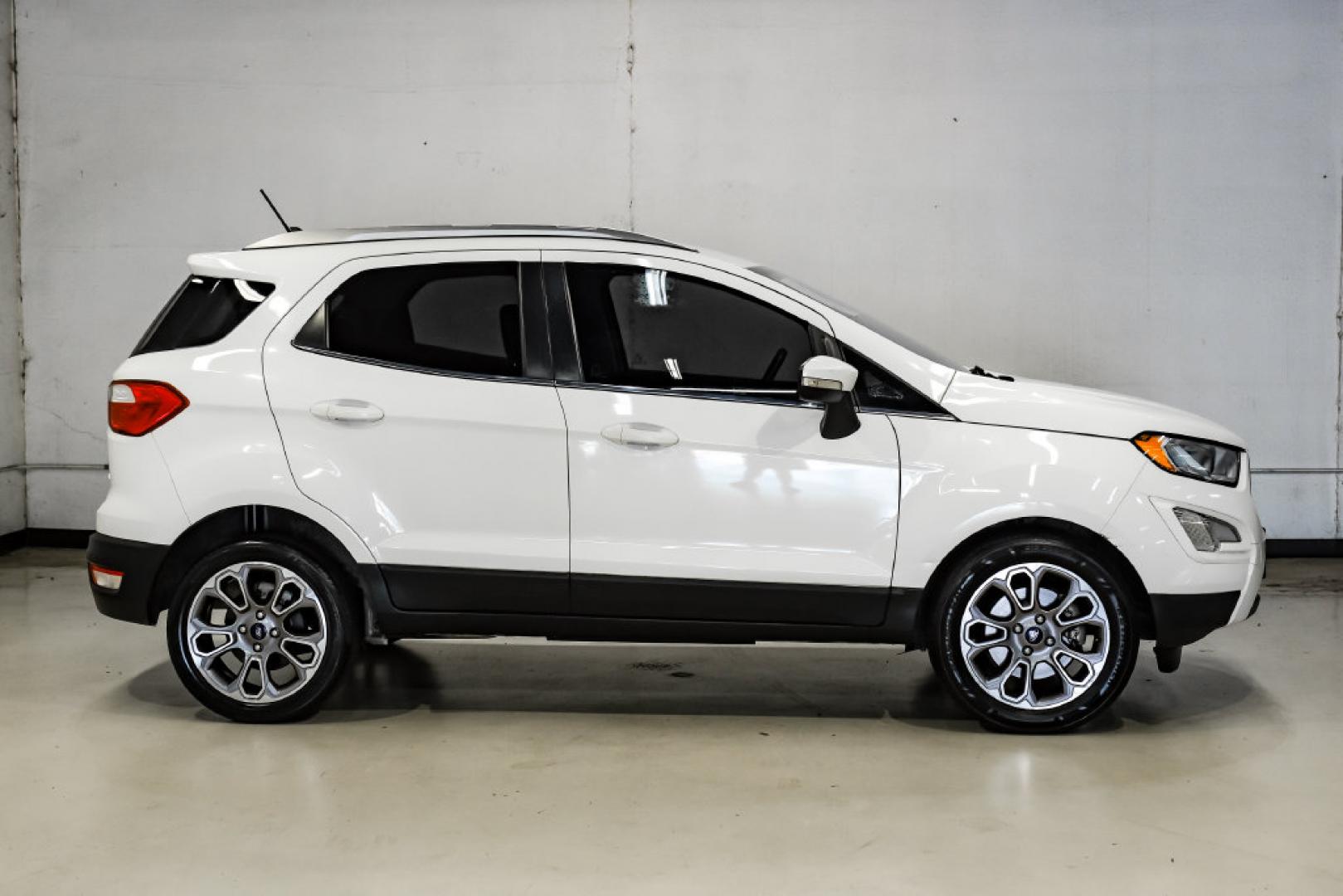 2021 Diamond White /Ebony Black Ford EcoSport Titanium (MAJ3S2KE2MC) with an EcoBoost 1.0L I3 GTDi DOHC Turbocharged VCT engine, Automatic transmission, located at 15300 Midway Rd., Addison, TX, 75001, (972) 702-0011, 32.958321, -96.838074- Photo#9