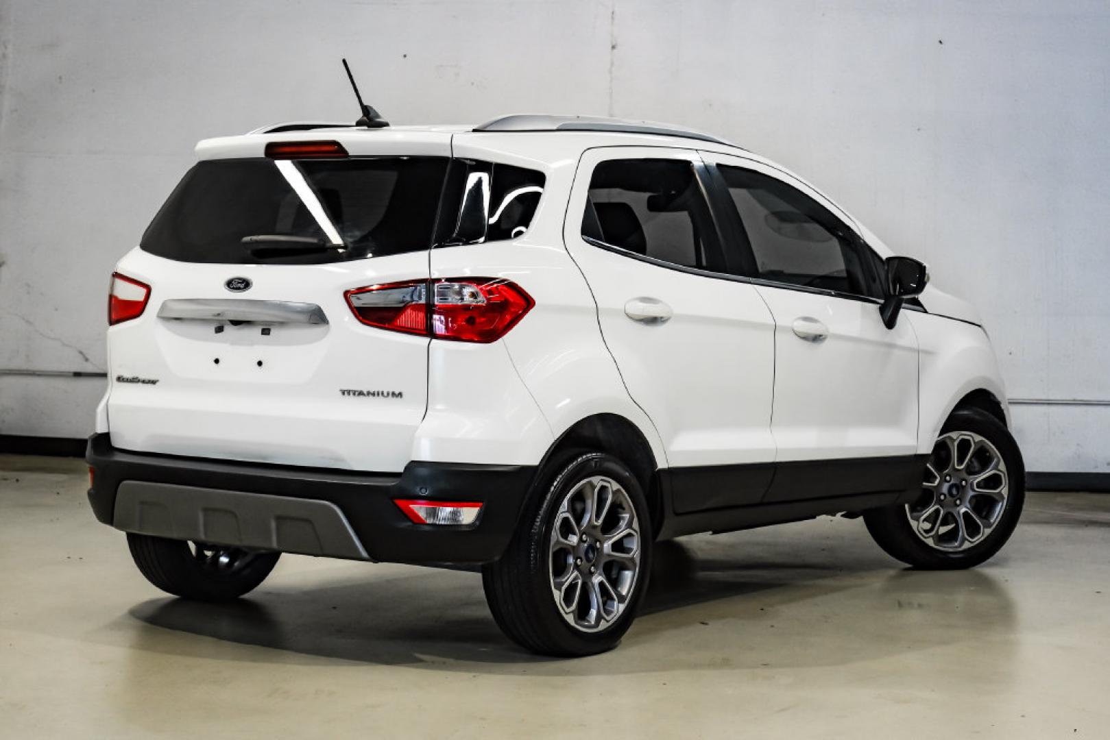 2021 Diamond White /Ebony Black Ford EcoSport Titanium (MAJ3S2KE2MC) with an EcoBoost 1.0L I3 GTDi DOHC Turbocharged VCT engine, Automatic transmission, located at 15300 Midway Rd., Addison, TX, 75001, (972) 702-0011, 32.958321, -96.838074- Photo#10