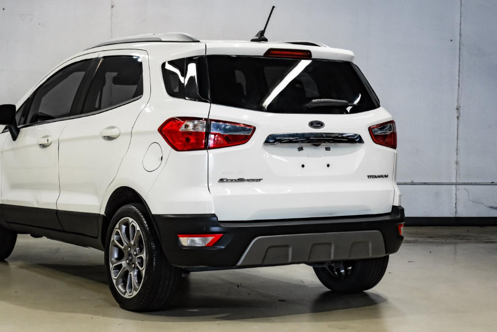 2021 Diamond White /Ebony Black Ford EcoSport Titanium (MAJ3S2KE2MC) with an EcoBoost 1.0L I3 GTDi DOHC Turbocharged VCT engine, Automatic transmission, located at 15300 Midway Rd., Addison, TX, 75001, (972) 702-0011, 32.958321, -96.838074- Photo#14