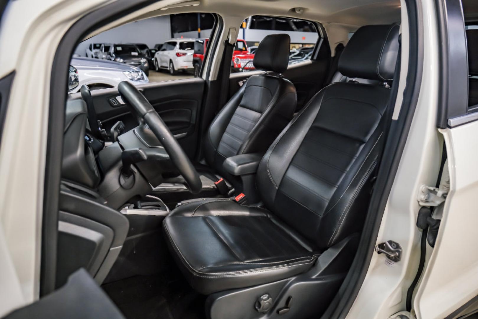 2021 Diamond White /Ebony Black Ford EcoSport Titanium (MAJ3S2KE2MC) with an EcoBoost 1.0L I3 GTDi DOHC Turbocharged VCT engine, Automatic transmission, located at 15300 Midway Rd., Addison, TX, 75001, (972) 702-0011, 32.958321, -96.838074- Photo#33