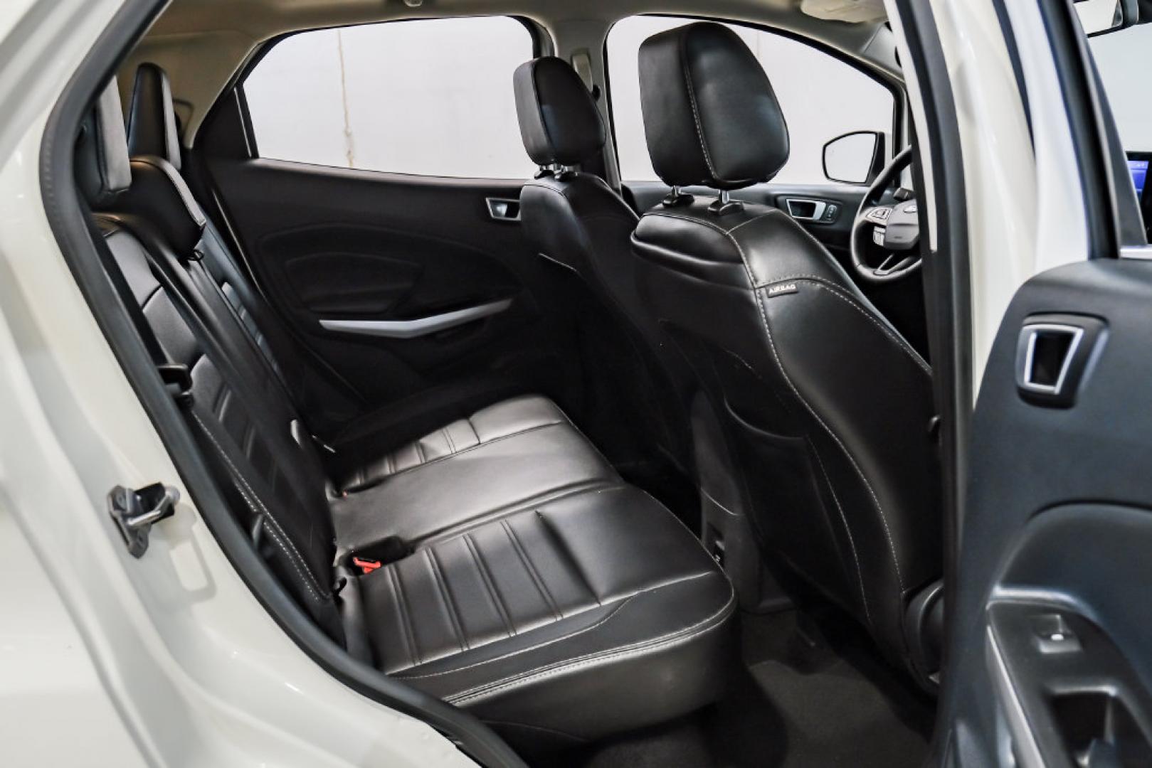 2021 Diamond White /Ebony Black Ford EcoSport Titanium (MAJ3S2KE2MC) with an EcoBoost 1.0L I3 GTDi DOHC Turbocharged VCT engine, Automatic transmission, located at 15300 Midway Rd., Addison, TX, 75001, (972) 702-0011, 32.958321, -96.838074- Photo#37