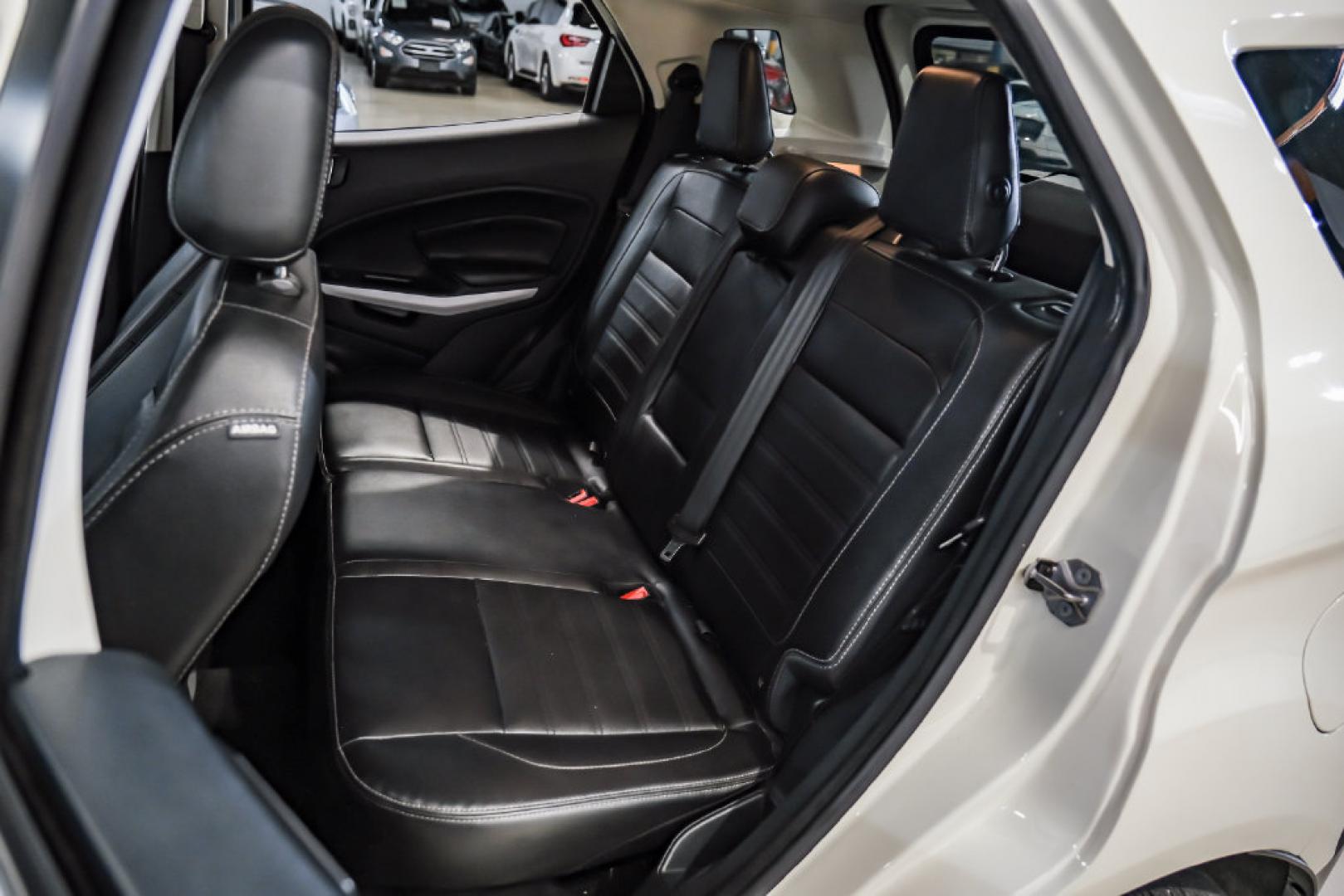 2021 Diamond White /Ebony Black Ford EcoSport Titanium (MAJ3S2KE2MC) with an EcoBoost 1.0L I3 GTDi DOHC Turbocharged VCT engine, Automatic transmission, located at 15300 Midway Rd., Addison, TX, 75001, (972) 702-0011, 32.958321, -96.838074- Photo#39