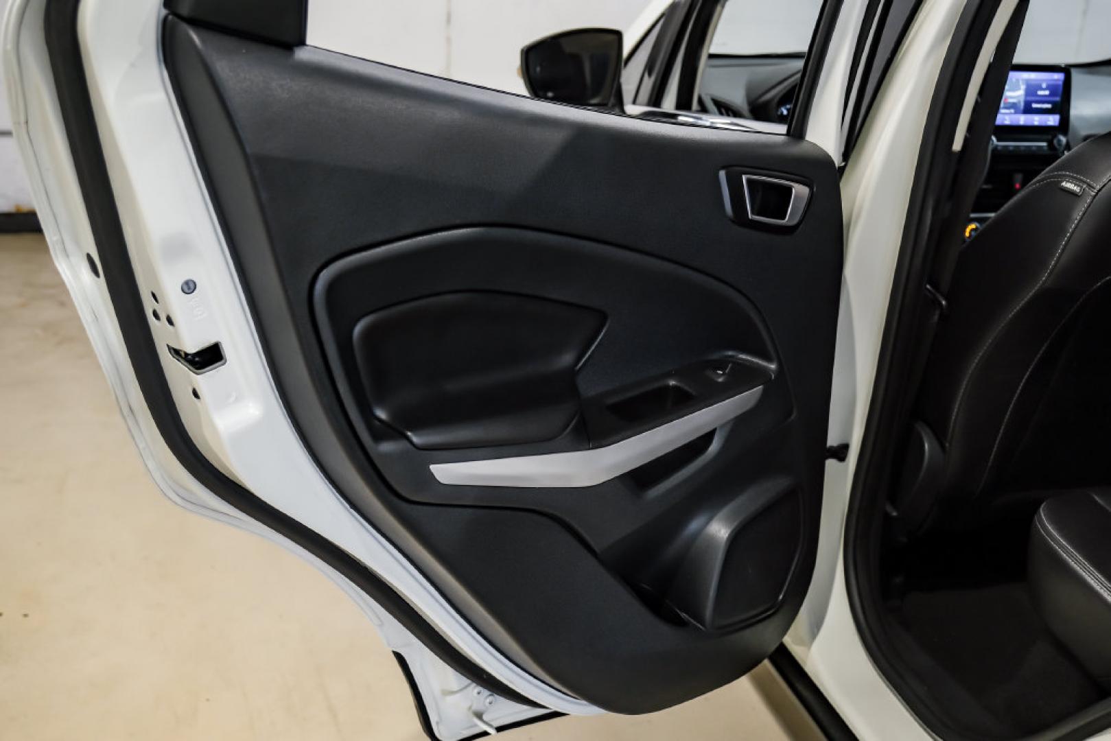 2021 Diamond White /Ebony Black Ford EcoSport Titanium (MAJ3S2KE2MC) with an EcoBoost 1.0L I3 GTDi DOHC Turbocharged VCT engine, Automatic transmission, located at 15300 Midway Rd., Addison, TX, 75001, (972) 702-0011, 32.958321, -96.838074- Photo#45