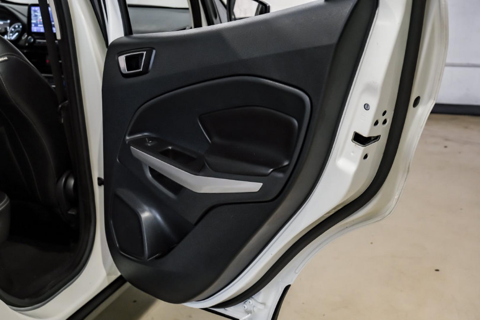 2021 Diamond White /Ebony Black Ford EcoSport Titanium (MAJ3S2KE2MC) with an EcoBoost 1.0L I3 GTDi DOHC Turbocharged VCT engine, Automatic transmission, located at 15300 Midway Rd., Addison, TX, 75001, (972) 702-0011, 32.958321, -96.838074- Photo#46