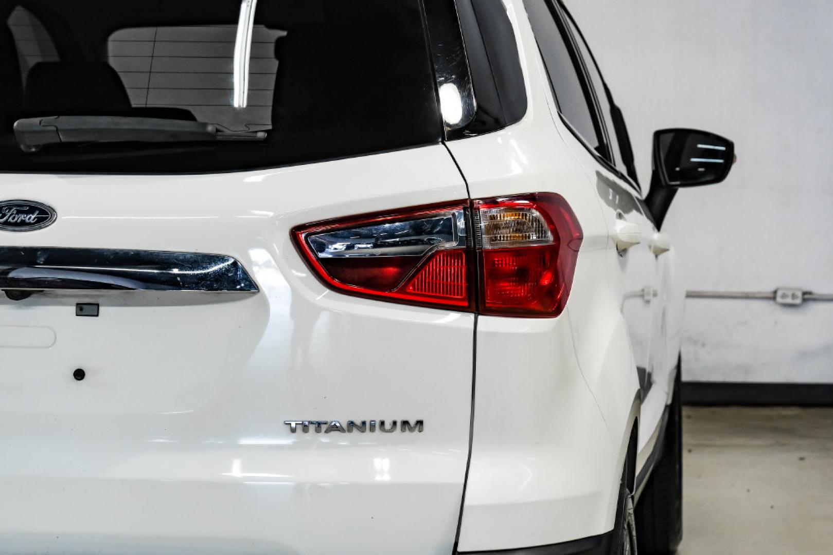 2021 Diamond White /Ebony Black Ford EcoSport Titanium (MAJ3S2KE2MC) with an EcoBoost 1.0L I3 GTDi DOHC Turbocharged VCT engine, Automatic transmission, located at 15300 Midway Rd., Addison, TX, 75001, (972) 702-0011, 32.958321, -96.838074- Photo#48