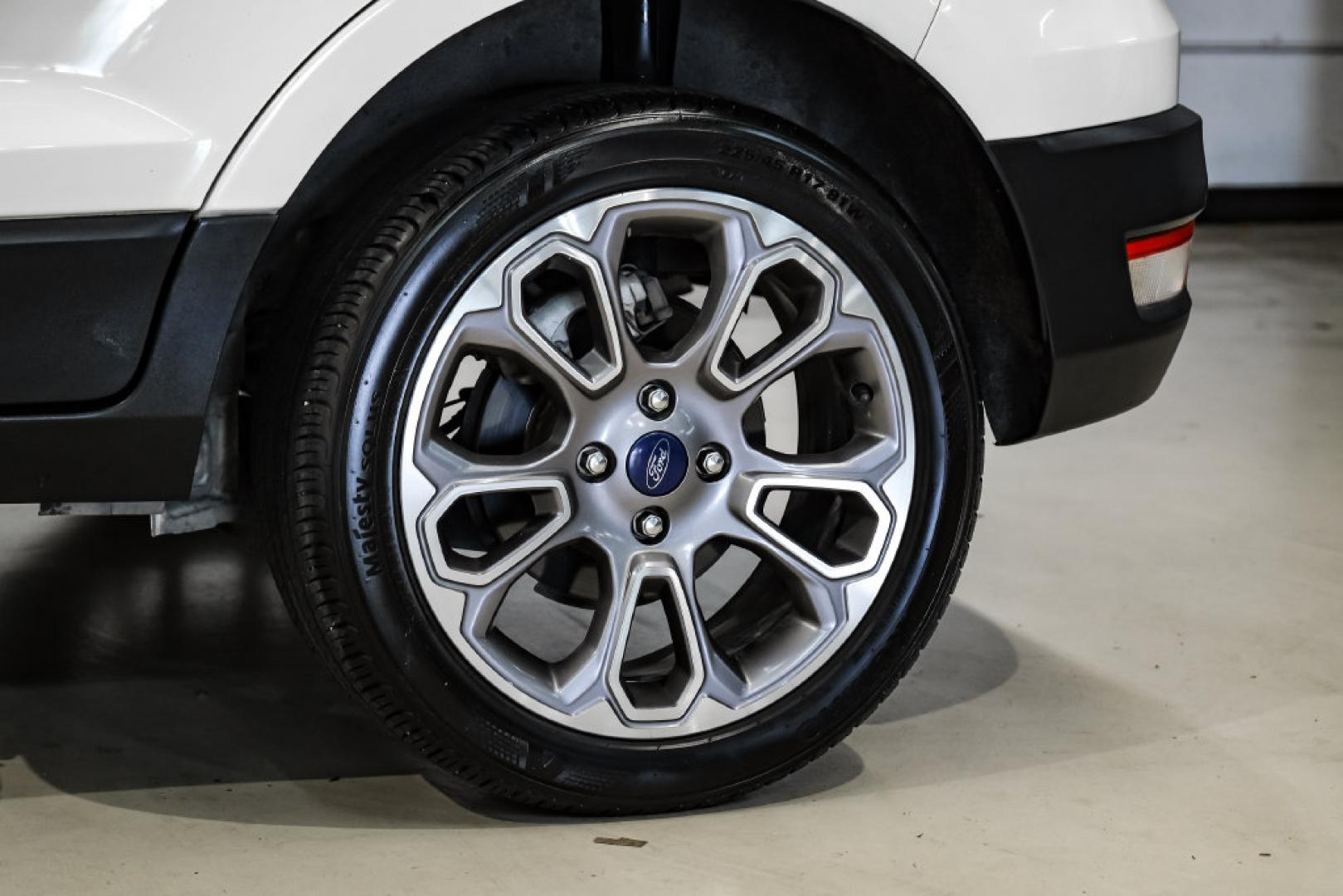2021 Diamond White /Ebony Black Ford EcoSport Titanium (MAJ3S2KE2MC) with an EcoBoost 1.0L I3 GTDi DOHC Turbocharged VCT engine, Automatic transmission, located at 15300 Midway Rd., Addison, TX, 75001, (972) 702-0011, 32.958321, -96.838074- Photo#52
