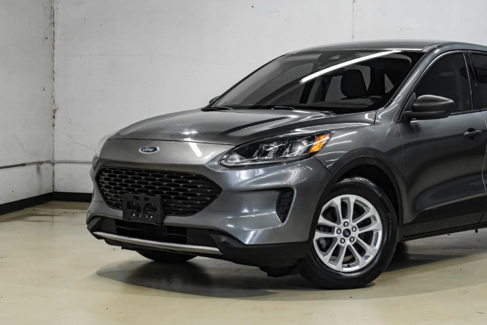 2021 Gray Metallic /Gray Ford Escape S (1FMCU0F62MU) with an 1.5L EcoBoost engine, Automatic transmission, located at 15300 Midway Rd., Addison, TX, 75001, (972) 702-0011, 32.958321, -96.838074- Photo#4