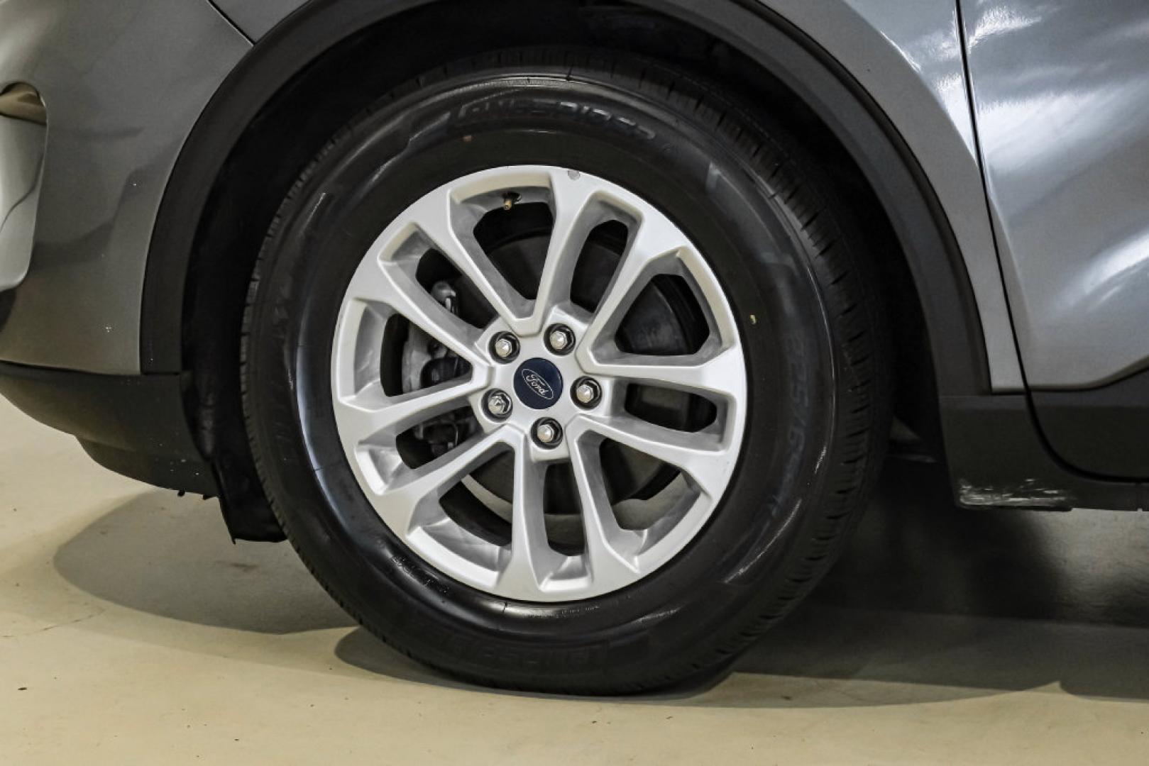 2021 Gray Metallic /Gray Ford Escape S (1FMCU0F62MU) with an 1.5L EcoBoost engine, Automatic transmission, located at 15300 Midway Rd., Addison, TX, 75001, (972) 702-0011, 32.958321, -96.838074- Photo#53