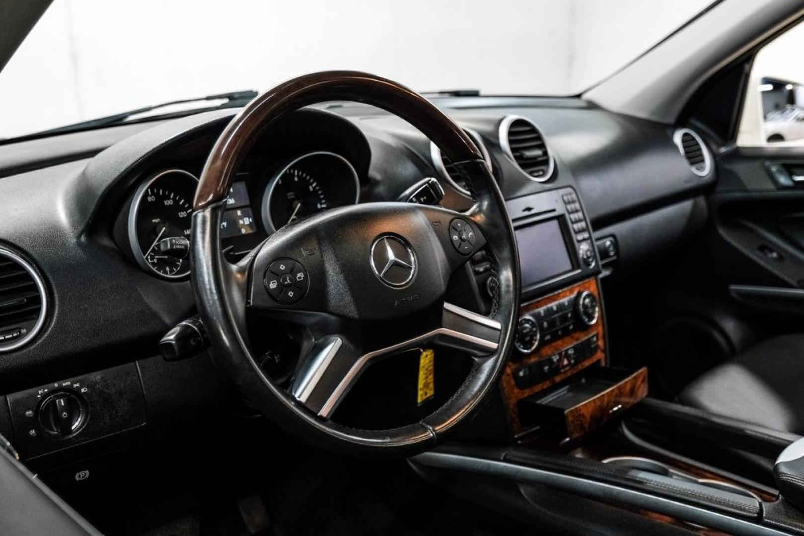 2011 Arctic White /Black Mercedes-Benz M-Class ML 350 (4JGBB8GB6BA) with an 3.5L V6 DOHC 24V engine, Automatic transmission, located at 15300 Midway Rd., Addison, TX, 75001, (972) 702-0011, 32.958321, -96.838074- Photo#21