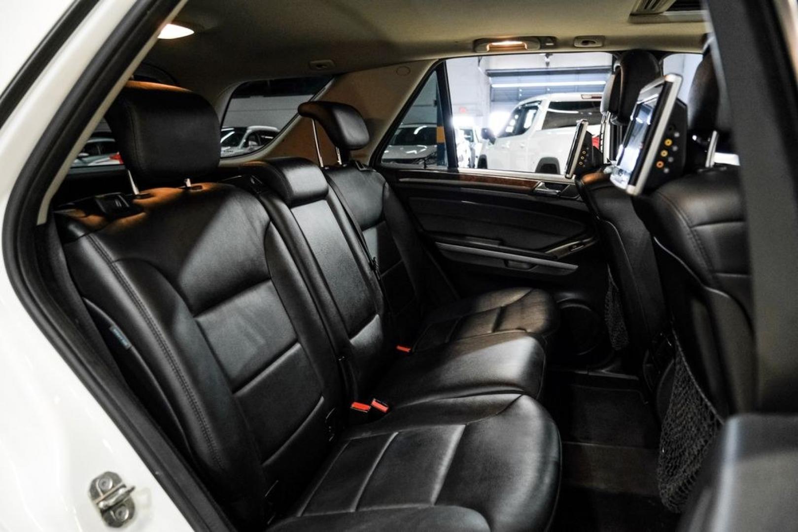 2011 Arctic White /Black Mercedes-Benz M-Class ML 350 (4JGBB8GB6BA) with an 3.5L V6 DOHC 24V engine, Automatic transmission, located at 15300 Midway Rd., Addison, TX, 75001, (972) 702-0011, 32.958321, -96.838074- Photo#38