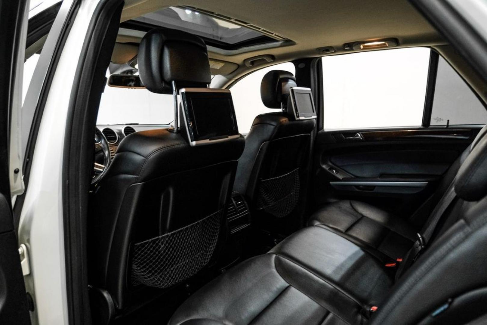 2011 Arctic White /Black Mercedes-Benz M-Class ML 350 (4JGBB8GB6BA) with an 3.5L V6 DOHC 24V engine, Automatic transmission, located at 15300 Midway Rd., Addison, TX, 75001, (972) 702-0011, 32.958321, -96.838074- Photo#40
