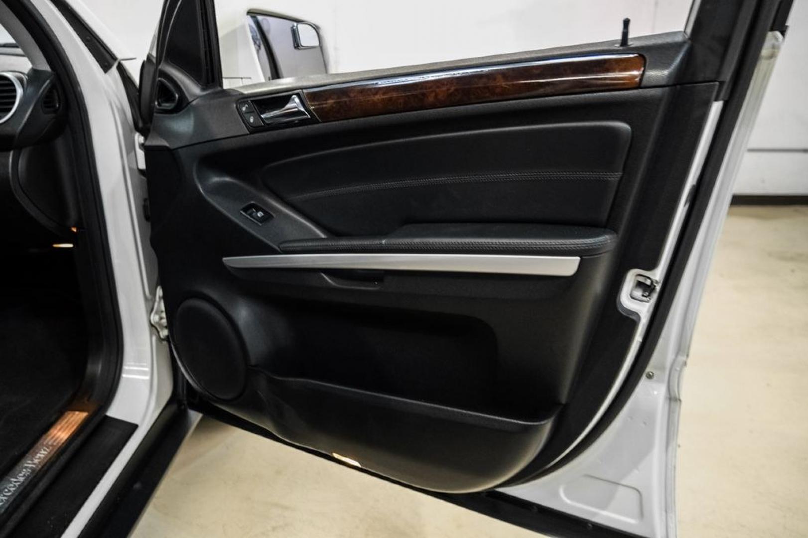 2011 Arctic White /Black Mercedes-Benz M-Class ML 350 (4JGBB8GB6BA) with an 3.5L V6 DOHC 24V engine, Automatic transmission, located at 15300 Midway Rd., Addison, TX, 75001, (972) 702-0011, 32.958321, -96.838074- Photo#46
