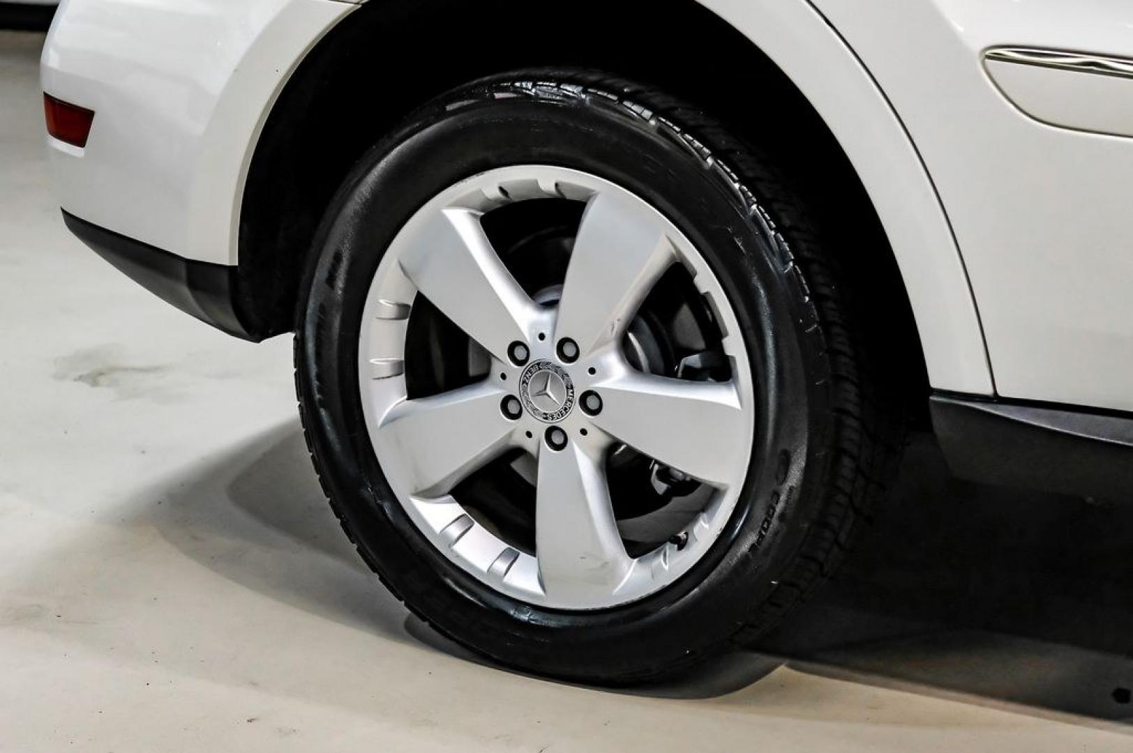2011 Arctic White /Black Mercedes-Benz M-Class ML 350 (4JGBB8GB6BA) with an 3.5L V6 DOHC 24V engine, Automatic transmission, located at 15300 Midway Rd., Addison, TX, 75001, (972) 702-0011, 32.958321, -96.838074- Photo#57