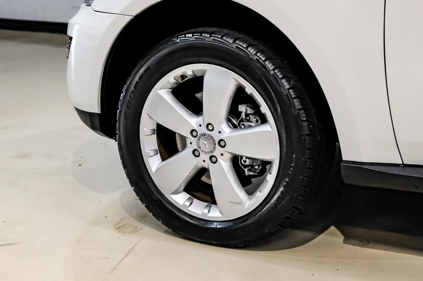 2011 Arctic White /Black Mercedes-Benz M-Class ML 350 (4JGBB8GB6BA) with an 3.5L V6 DOHC 24V engine, Automatic transmission, located at 15300 Midway Rd., Addison, TX, 75001, (972) 702-0011, 32.958321, -96.838074- Photo#59