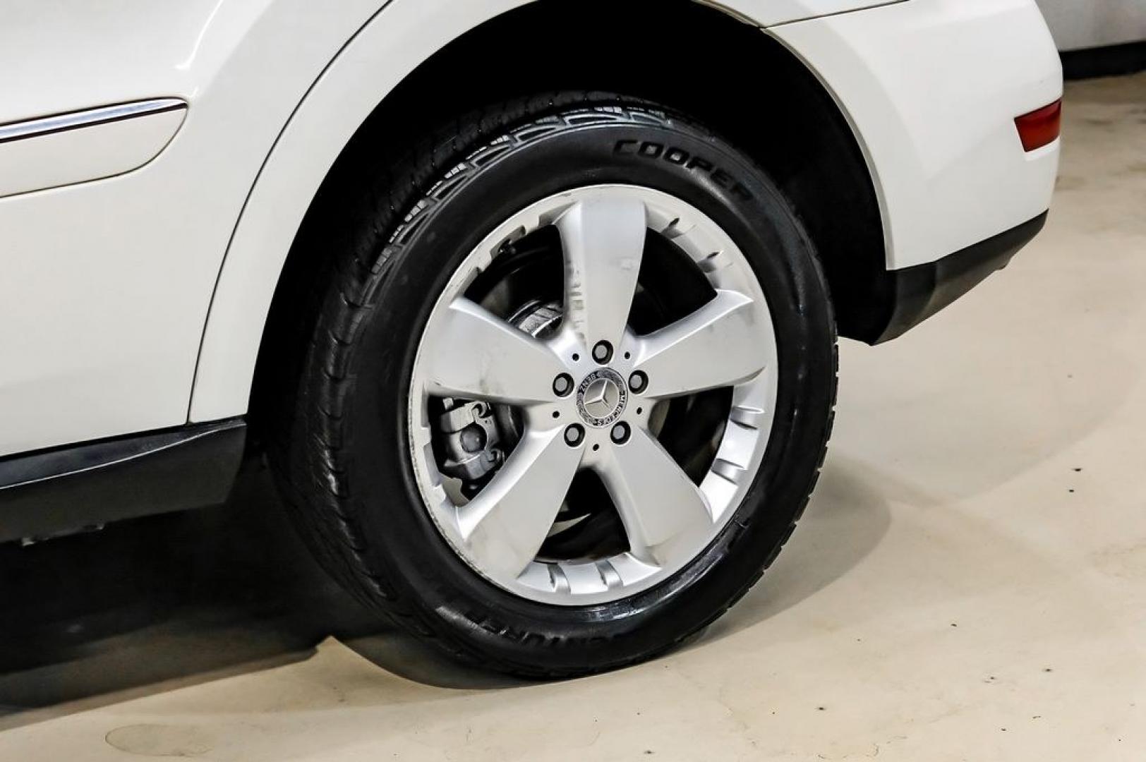 2011 Arctic White /Black Mercedes-Benz M-Class ML 350 (4JGBB8GB6BA) with an 3.5L V6 DOHC 24V engine, Automatic transmission, located at 15300 Midway Rd., Addison, TX, 75001, (972) 702-0011, 32.958321, -96.838074- Photo#60
