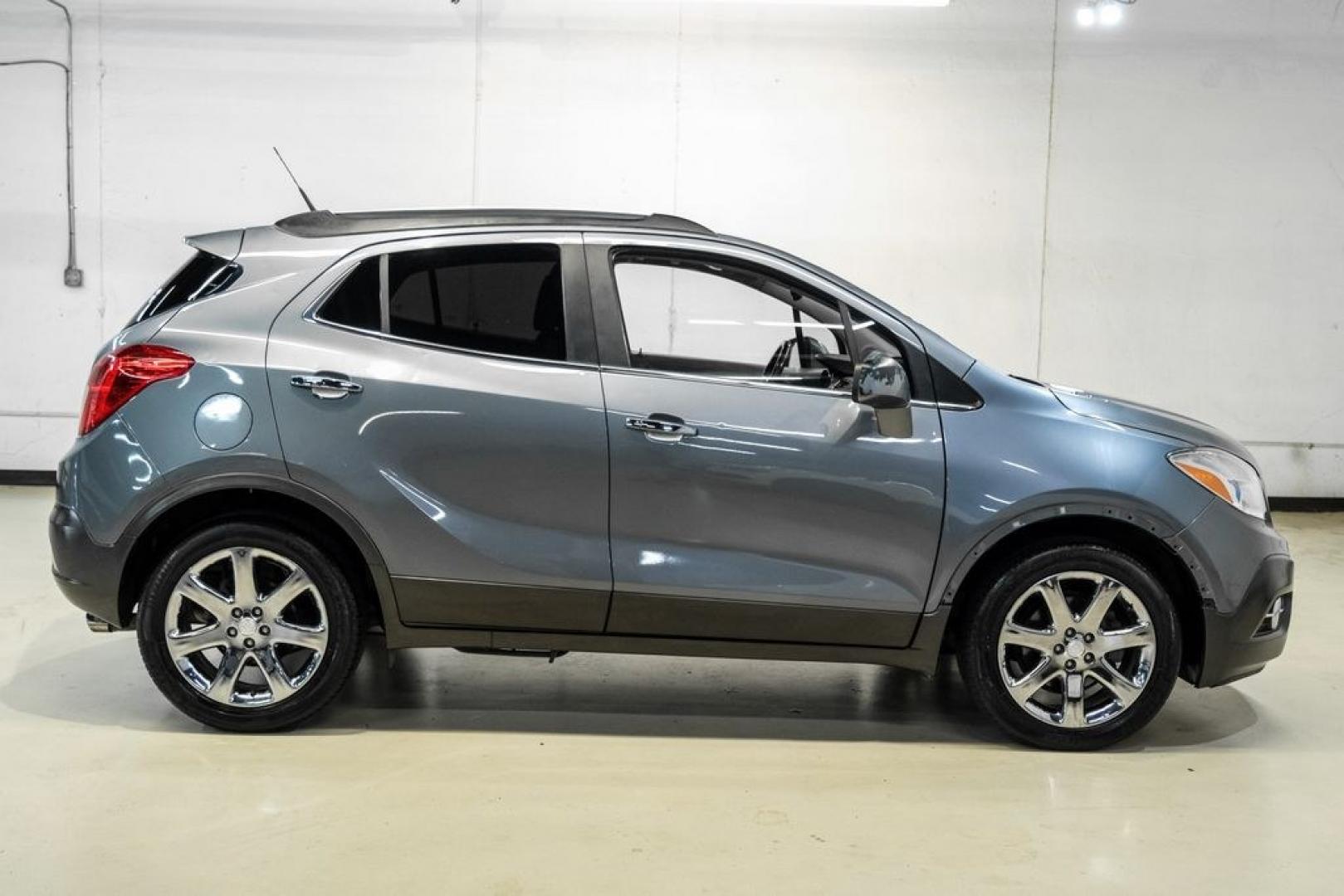 2013 Steel Gray Metallic /Titanium Buick Encore Premium (KL4CJDSB4DB) with an ECOTEC 1.4L I4 SMPI DOHC Turbocharged VVT engine, Automatic transmission, located at 15300 Midway Rd., Addison, TX, 75001, (972) 702-0011, 32.958321, -96.838074- Photo#7