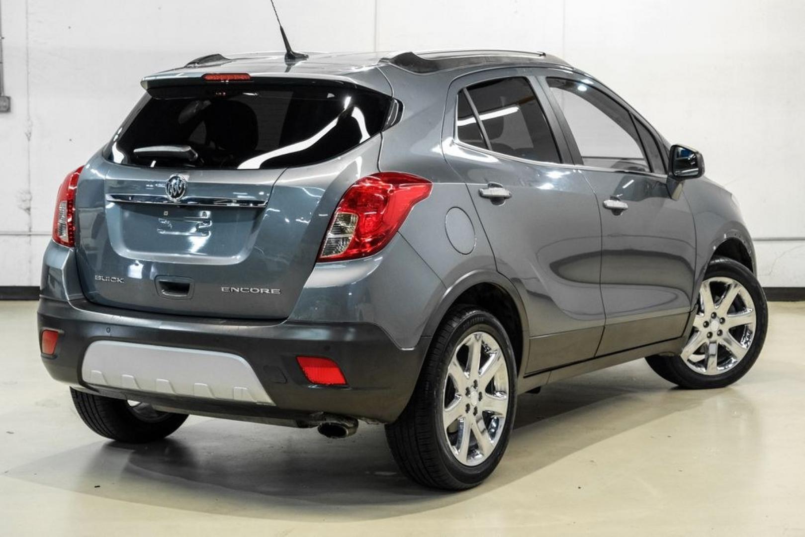 2013 Steel Gray Metallic /Titanium Buick Encore Premium (KL4CJDSB4DB) with an ECOTEC 1.4L I4 SMPI DOHC Turbocharged VVT engine, Automatic transmission, located at 15300 Midway Rd., Addison, TX, 75001, (972) 702-0011, 32.958321, -96.838074- Photo#8
