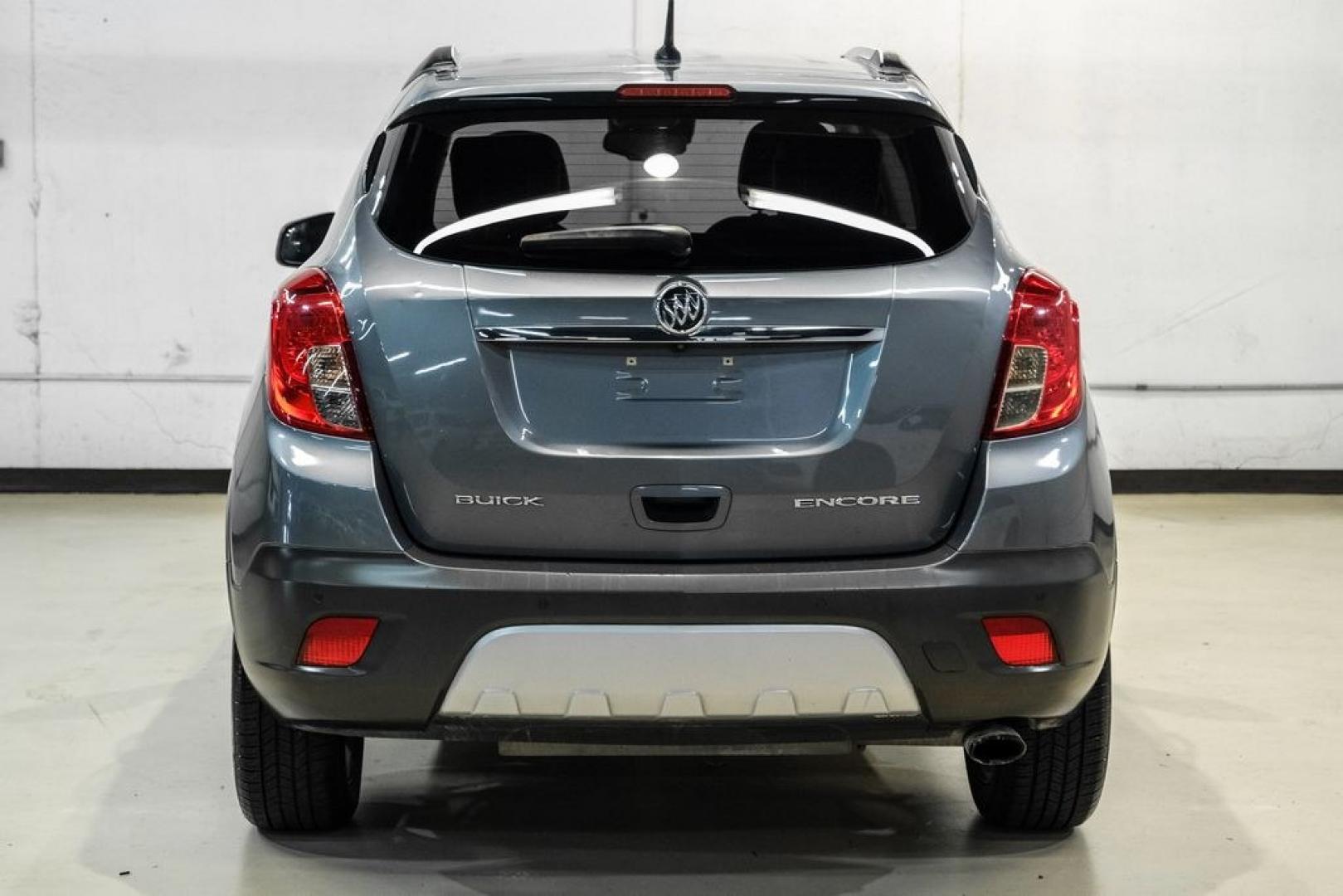 2013 Steel Gray Metallic /Titanium Buick Encore Premium (KL4CJDSB4DB) with an ECOTEC 1.4L I4 SMPI DOHC Turbocharged VVT engine, Automatic transmission, located at 15300 Midway Rd., Addison, TX, 75001, (972) 702-0011, 32.958321, -96.838074- Photo#9