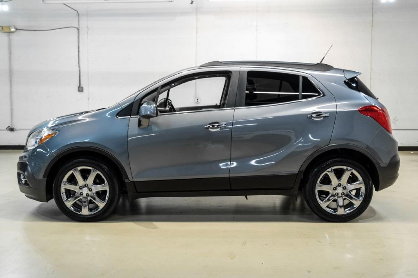 2013 Steel Gray Metallic /Titanium Buick Encore Premium (KL4CJDSB4DB) with an ECOTEC 1.4L I4 SMPI DOHC Turbocharged VVT engine, Automatic transmission, located at 15300 Midway Rd., Addison, TX, 75001, (972) 702-0011, 32.958321, -96.838074- Photo#11