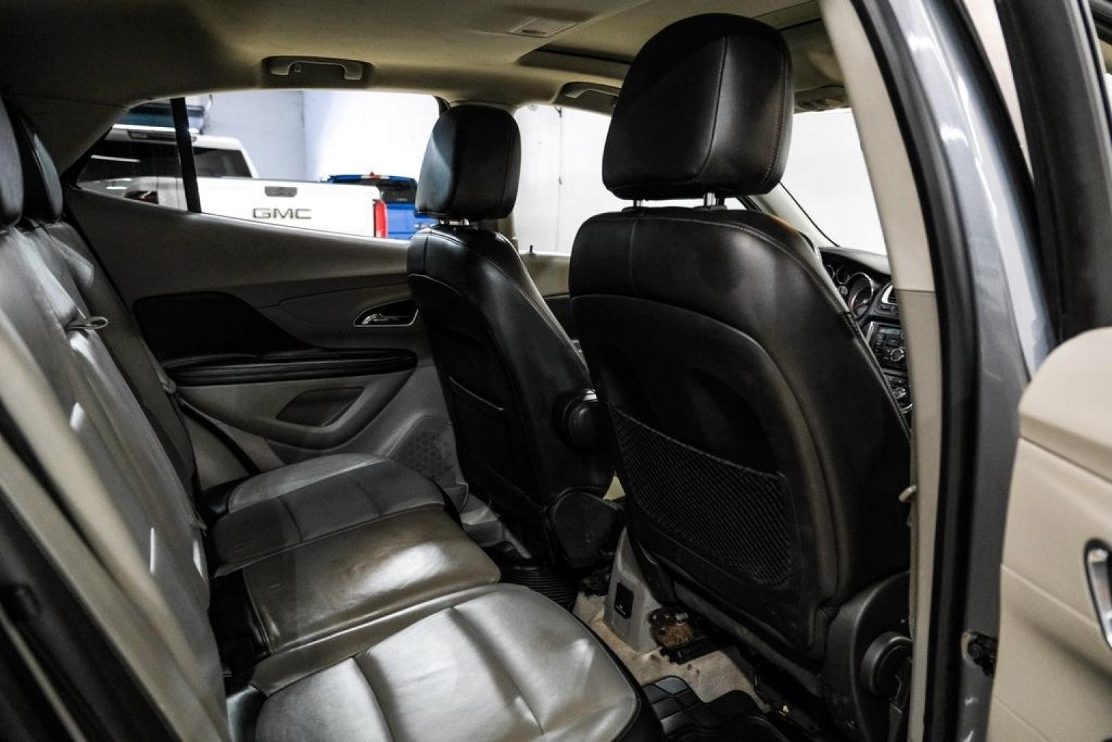 2013 Steel Gray Metallic /Titanium Buick Encore Premium (KL4CJDSB4DB) with an ECOTEC 1.4L I4 SMPI DOHC Turbocharged VVT engine, Automatic transmission, located at 15300 Midway Rd., Addison, TX, 75001, (972) 702-0011, 32.958321, -96.838074- Photo#32