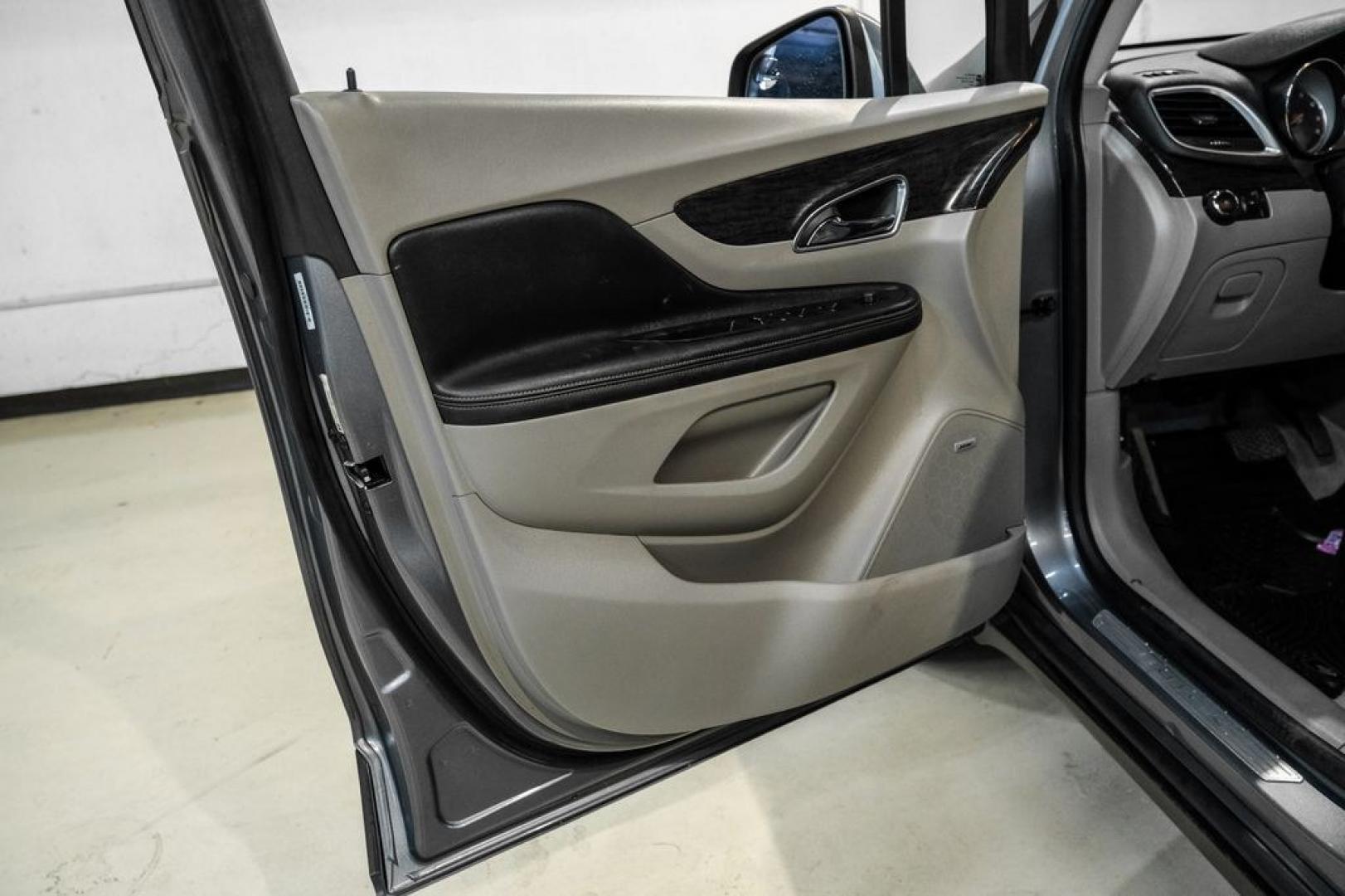 2013 Steel Gray Metallic /Titanium Buick Encore Premium (KL4CJDSB4DB) with an ECOTEC 1.4L I4 SMPI DOHC Turbocharged VVT engine, Automatic transmission, located at 15300 Midway Rd., Addison, TX, 75001, (972) 702-0011, 32.958321, -96.838074- Photo#35