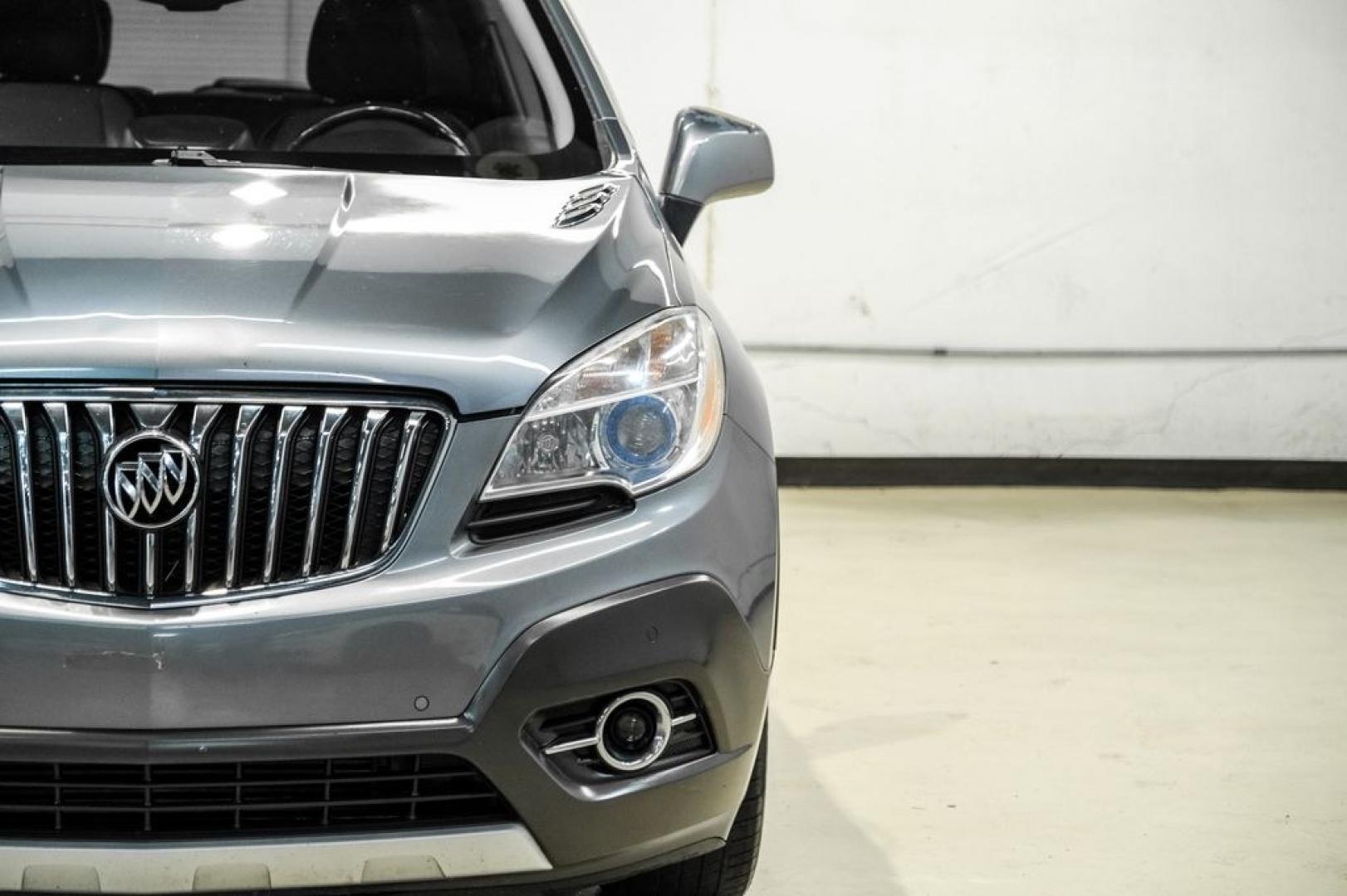 2013 Steel Gray Metallic /Titanium Buick Encore Premium (KL4CJDSB4DB) with an ECOTEC 1.4L I4 SMPI DOHC Turbocharged VVT engine, Automatic transmission, located at 15300 Midway Rd., Addison, TX, 75001, (972) 702-0011, 32.958321, -96.838074- Photo#40