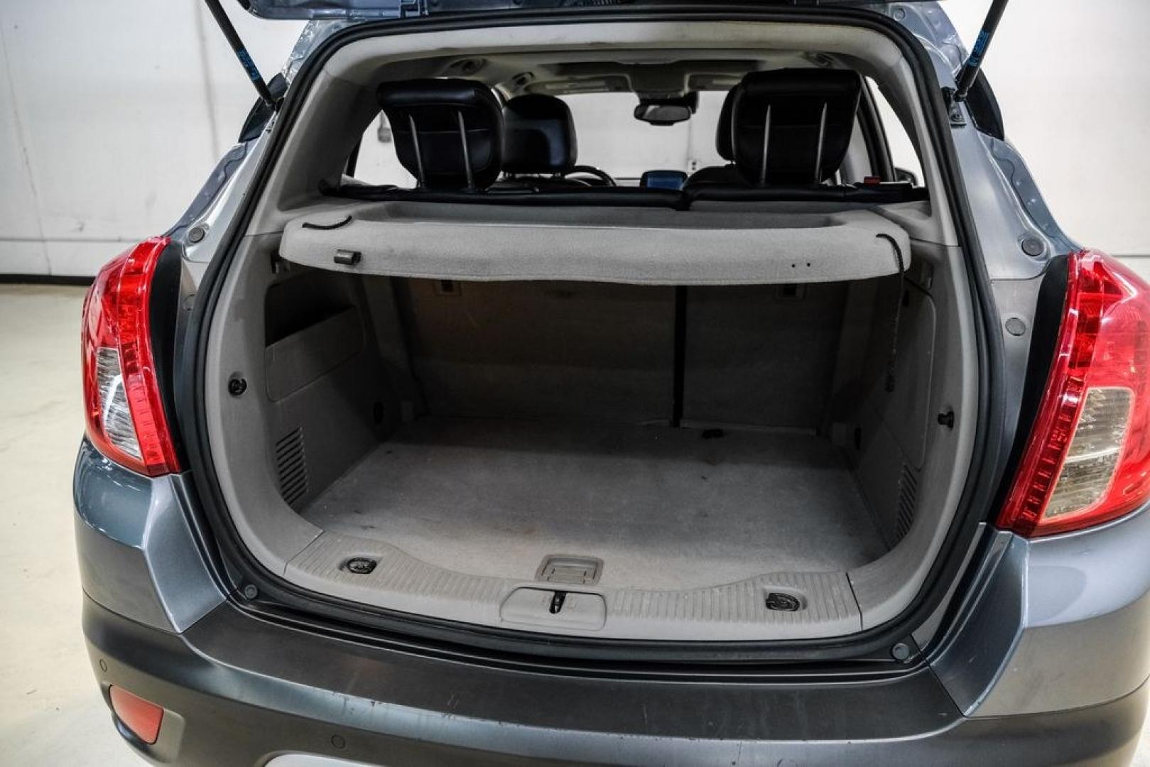 2013 Steel Gray Metallic /Titanium Buick Encore Premium (KL4CJDSB4DB) with an ECOTEC 1.4L I4 SMPI DOHC Turbocharged VVT engine, Automatic transmission, located at 15300 Midway Rd., Addison, TX, 75001, (972) 702-0011, 32.958321, -96.838074- Photo#45