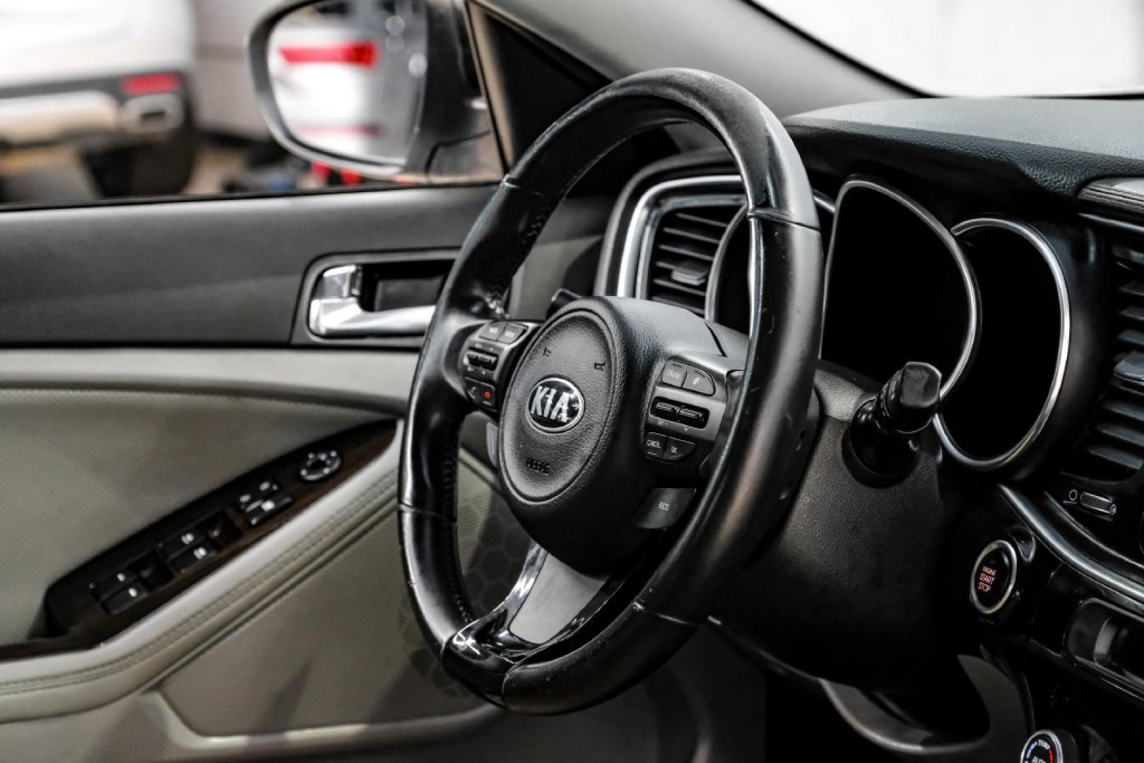 2014 Bright Silver /Gray Kia Optima EX (5XXGN4A77EG) with an 2.4L I4 DGI DOHC engine, Automatic transmission, located at 15300 Midway Rd., Addison, TX, 75001, (972) 702-0011, 32.958321, -96.838074- Photo#12