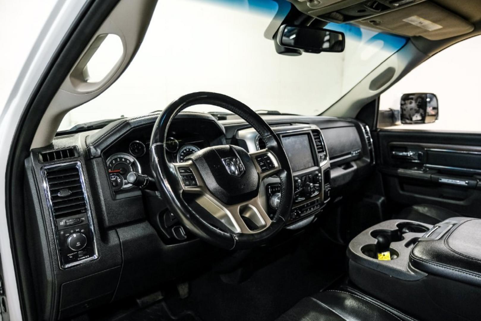 2018 Bright White Clearcoat /Black Ram 1500 Laramie (1C6RR7NM3JS) with an EcoDiesel 3.0L V6 engine, Automatic transmission, located at 15300 Midway Rd., Addison, TX, 75001, (972) 702-0011, 32.958321, -96.838074- Photo#2