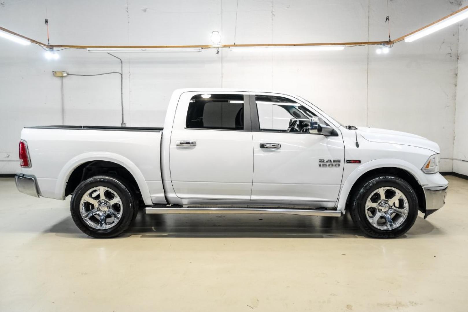 2018 Bright White Clearcoat /Black Ram 1500 Laramie (1C6RR7NM3JS) with an EcoDiesel 3.0L V6 engine, Automatic transmission, located at 15300 Midway Rd., Addison, TX, 75001, (972) 702-0011, 32.958321, -96.838074- Photo#6