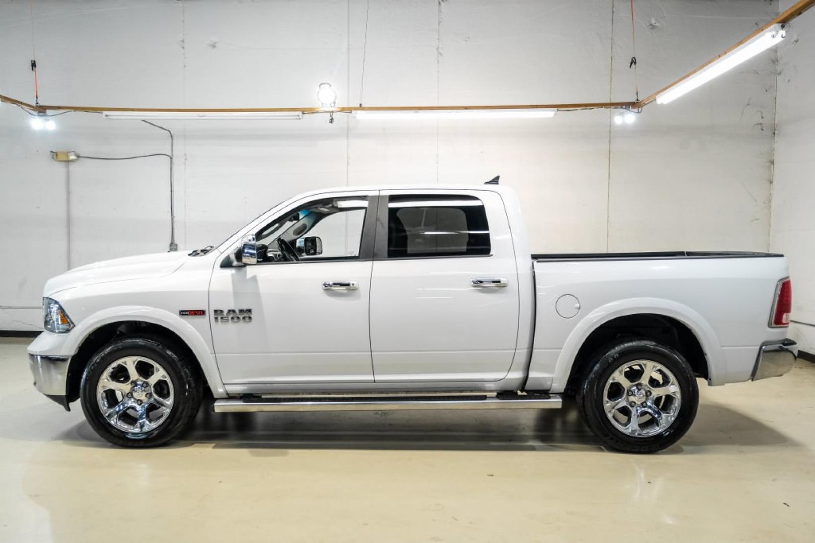 2018 Bright White Clearcoat /Black Ram 1500 Laramie (1C6RR7NM3JS) with an EcoDiesel 3.0L V6 engine, Automatic transmission, located at 15300 Midway Rd., Addison, TX, 75001, (972) 702-0011, 32.958321, -96.838074- Photo#10