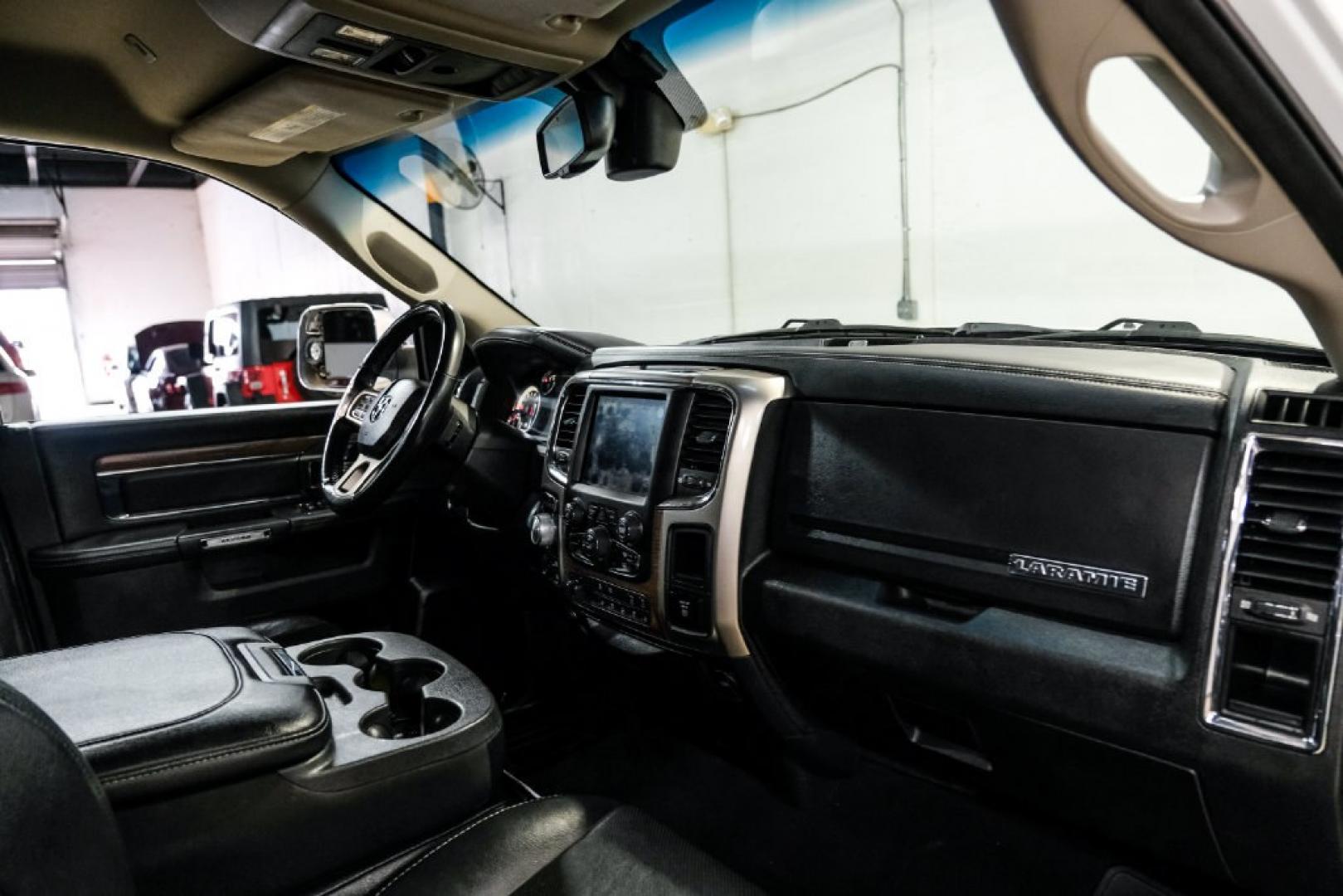 2018 Bright White Clearcoat /Black Ram 1500 Laramie (1C6RR7NM3JS) with an EcoDiesel 3.0L V6 engine, Automatic transmission, located at 15300 Midway Rd., Addison, TX, 75001, (972) 702-0011, 32.958321, -96.838074- Photo#11