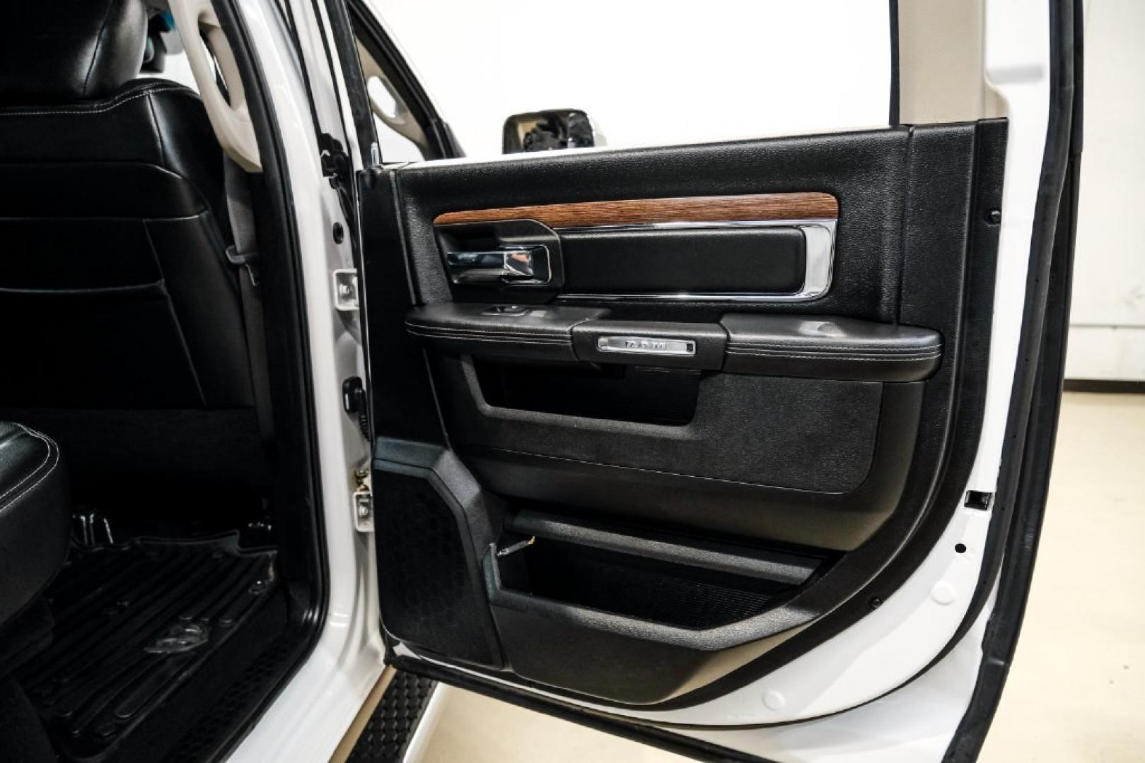 2018 Bright White Clearcoat /Black Ram 1500 Laramie (1C6RR7NM3JS) with an EcoDiesel 3.0L V6 engine, Automatic transmission, located at 15300 Midway Rd., Addison, TX, 75001, (972) 702-0011, 32.958321, -96.838074- Photo#39