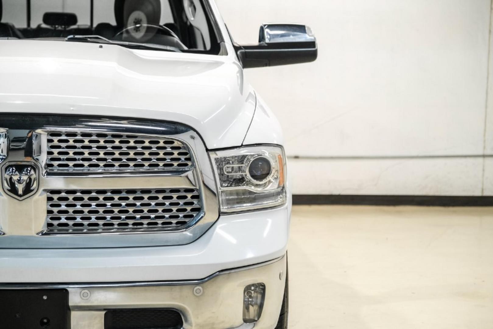 2018 Bright White Clearcoat /Black Ram 1500 Laramie (1C6RR7NM3JS) with an EcoDiesel 3.0L V6 engine, Automatic transmission, located at 15300 Midway Rd., Addison, TX, 75001, (972) 702-0011, 32.958321, -96.838074- Photo#40