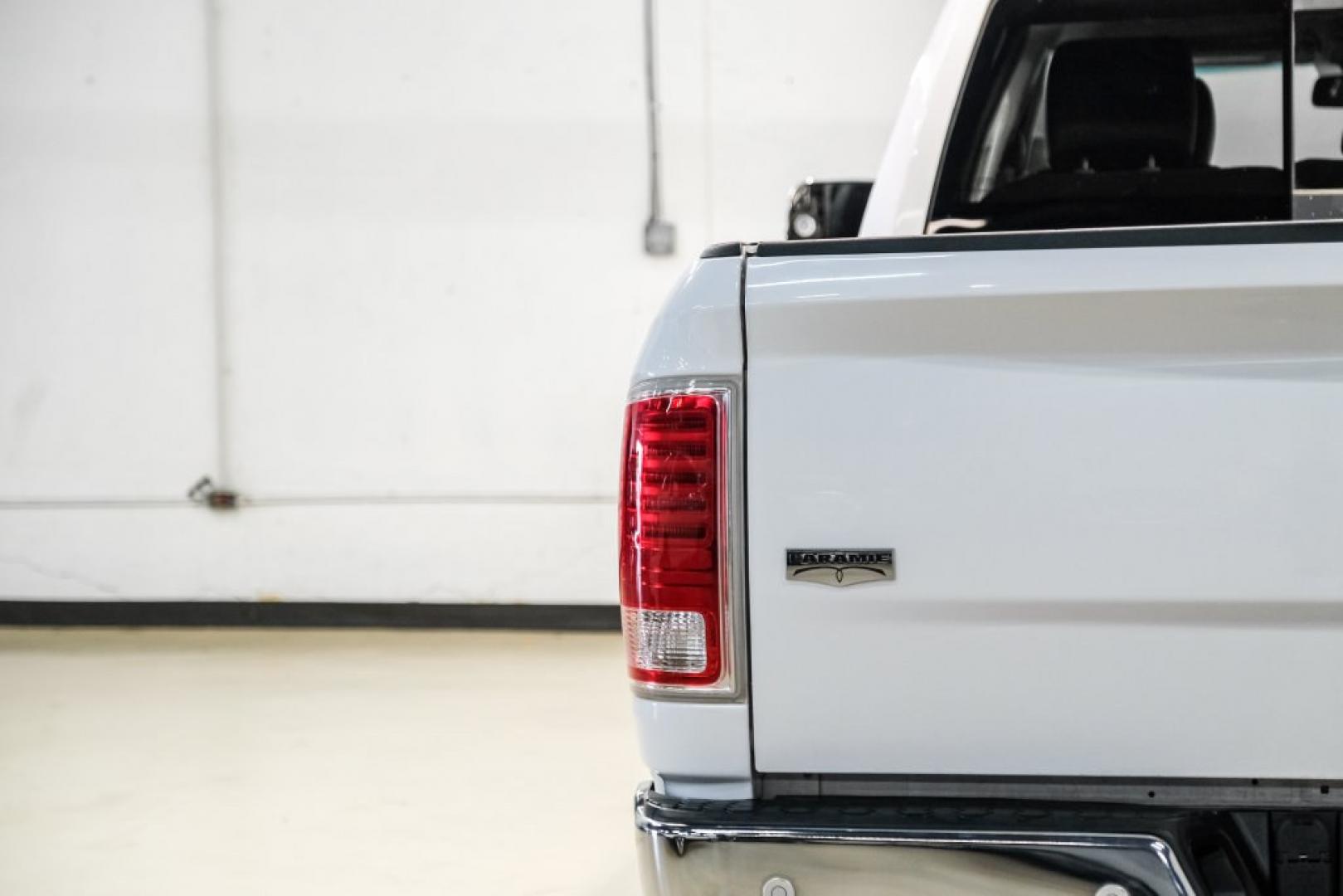 2018 Bright White Clearcoat /Black Ram 1500 Laramie (1C6RR7NM3JS) with an EcoDiesel 3.0L V6 engine, Automatic transmission, located at 15300 Midway Rd., Addison, TX, 75001, (972) 702-0011, 32.958321, -96.838074- Photo#41