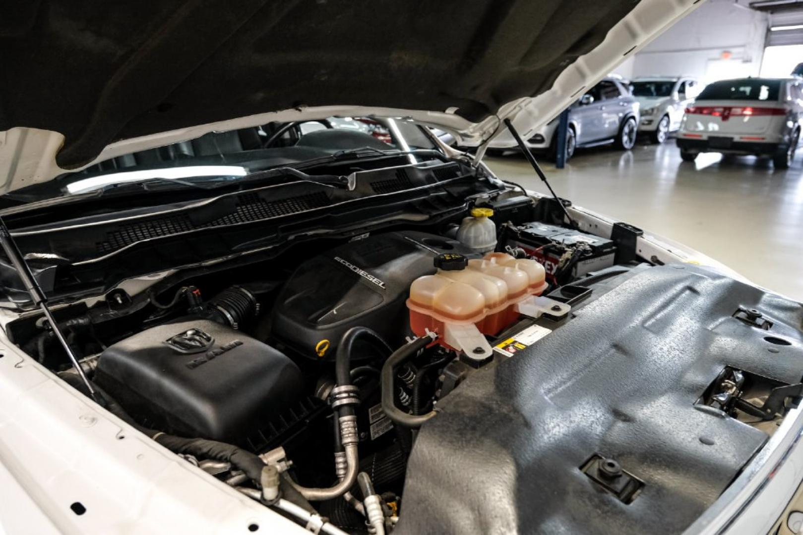 2018 Bright White Clearcoat /Black Ram 1500 Laramie (1C6RR7NM3JS) with an EcoDiesel 3.0L V6 engine, Automatic transmission, located at 15300 Midway Rd., Addison, TX, 75001, (972) 702-0011, 32.958321, -96.838074- Photo#44
