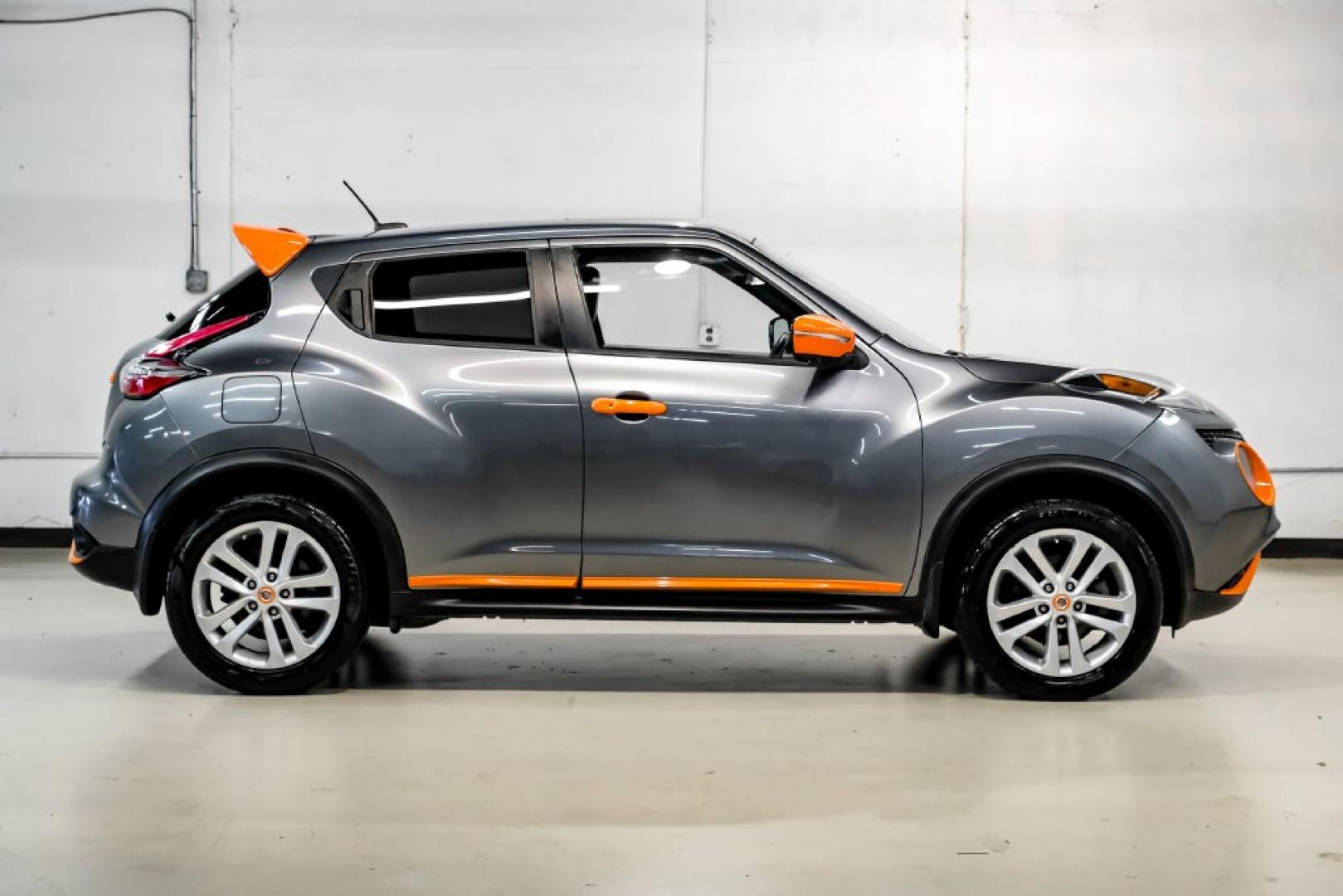 2015 Gun Metallic /Black Nissan Juke SL (JN8AF5MV6FT) with an 1.6L I4 DOHC 16V engine, CVT transmission, located at 15300 Midway Rd., Addison, TX, 75001, (972) 702-0011, 32.958321, -96.838074- Photo#7
